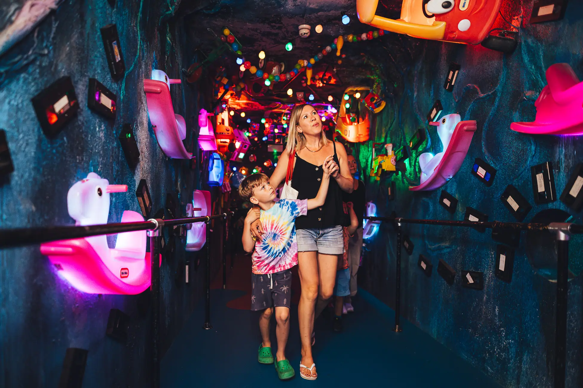 Visitors exploring a nostalgia-themed installation at Wake The Tiger