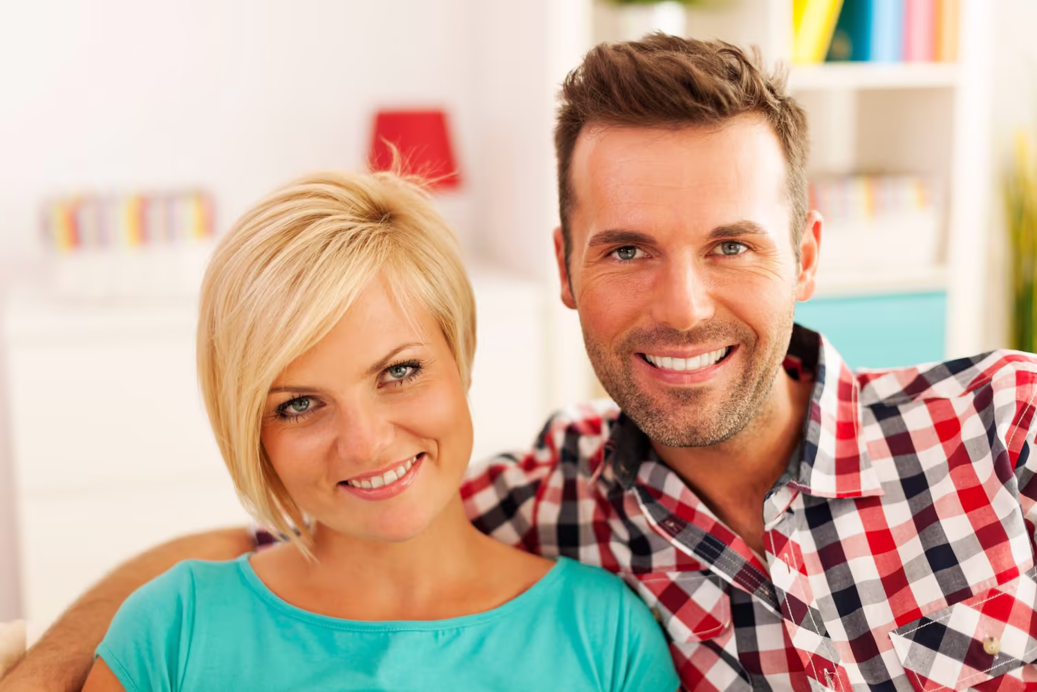 Smiling couple at home