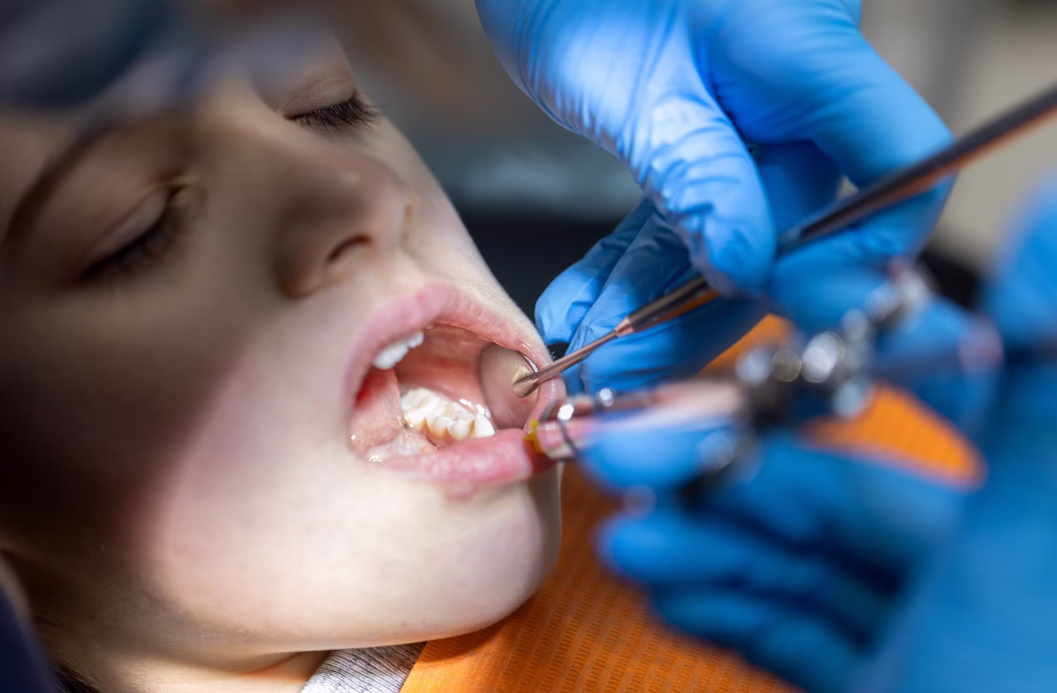 Close-up of dental treatment in progress