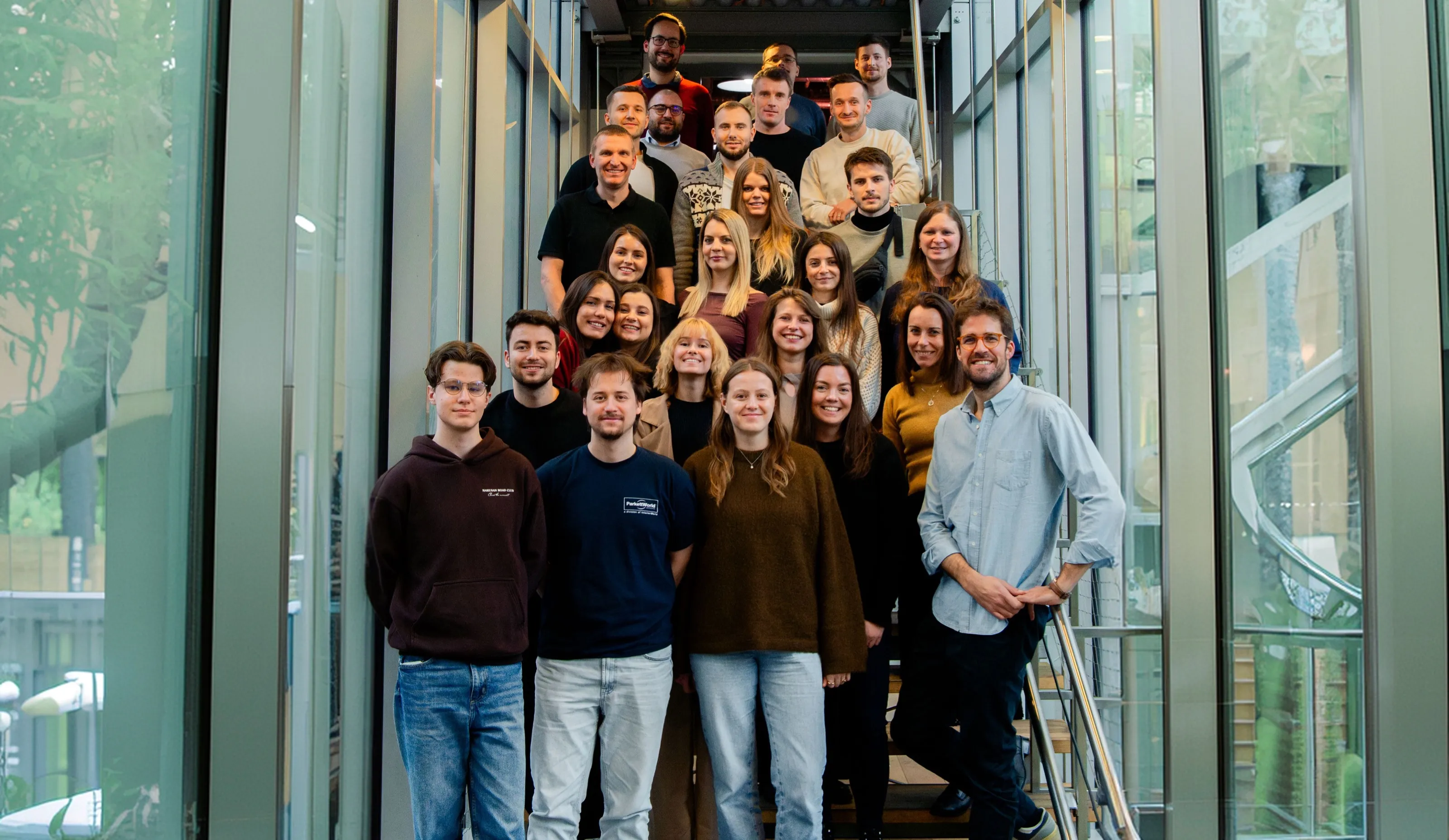 The Realpad team on the office stairs