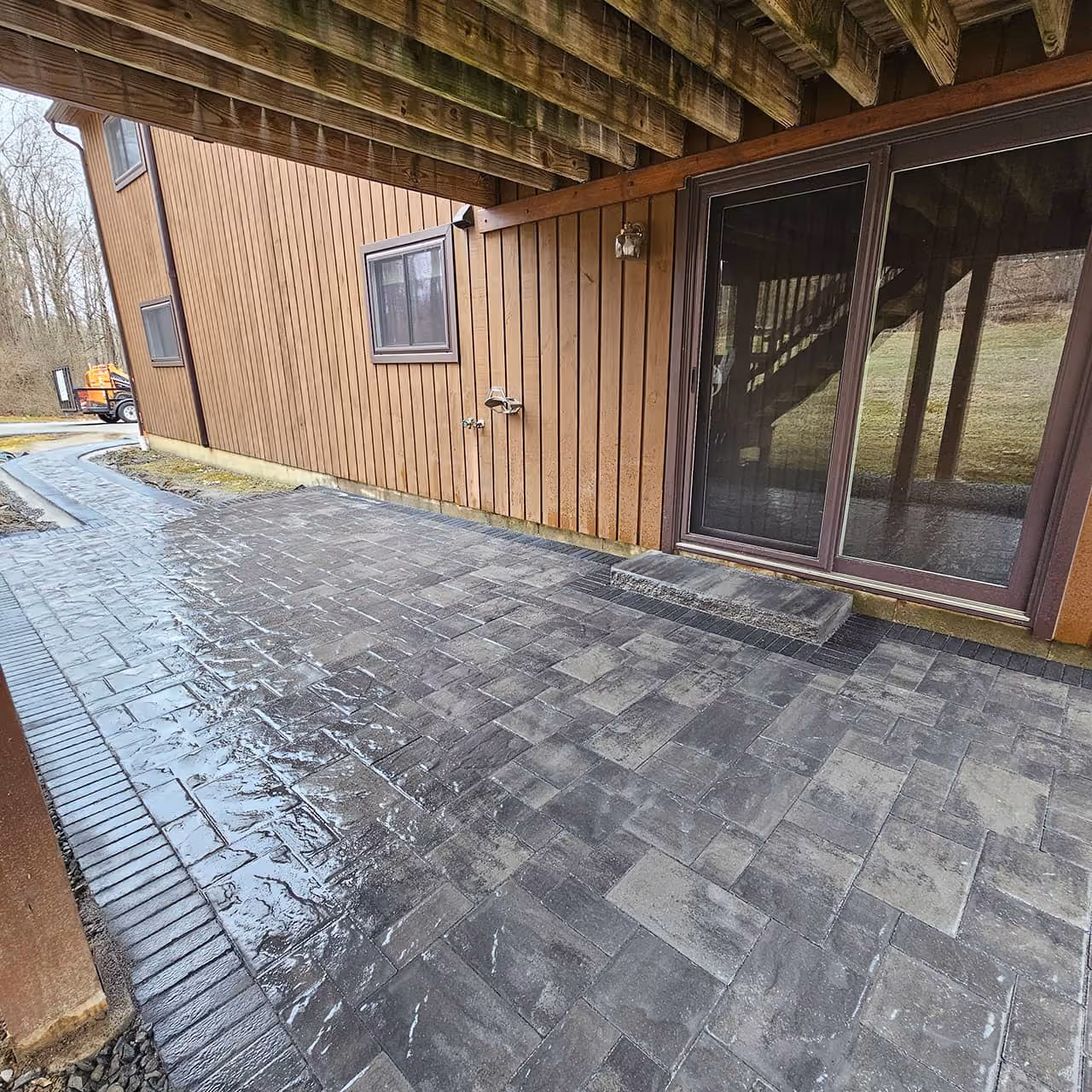 Stone patio in backyard by Classic Outdoors near me in Litchfield County CT