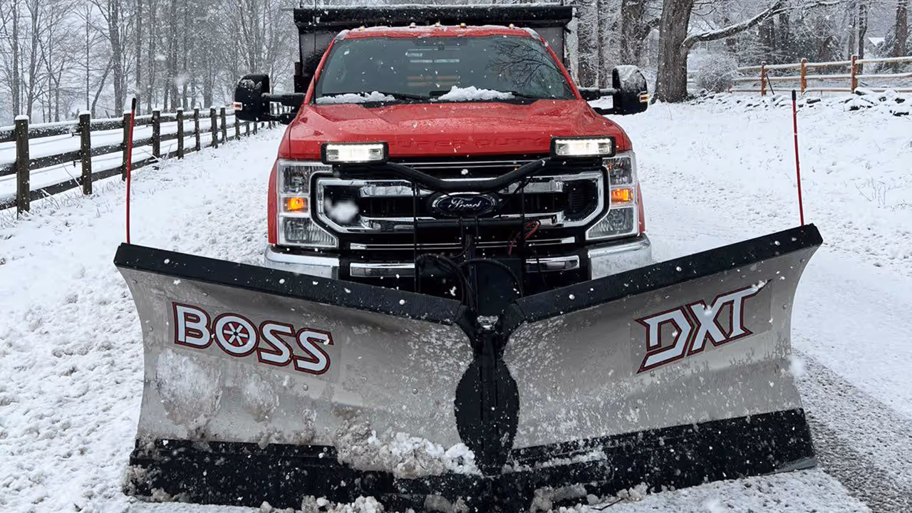 Snow-plow truck clearing driveway, Classic Outdoors Litchfield County CT