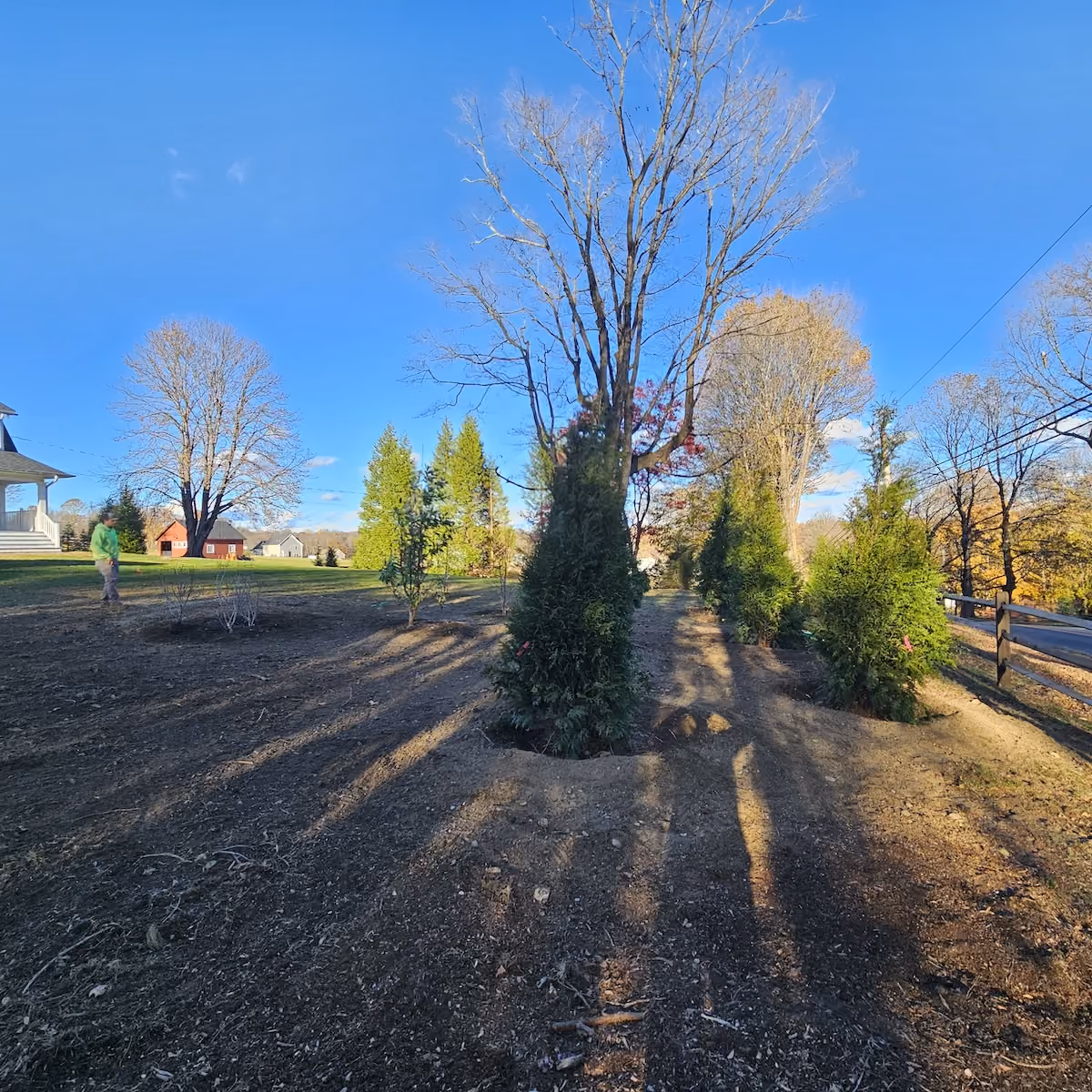 Professional landscape installation by Classic Outdoors in Connecticut, featuring custom landscape beds, plantings, shrubs, and outdoor improvements.