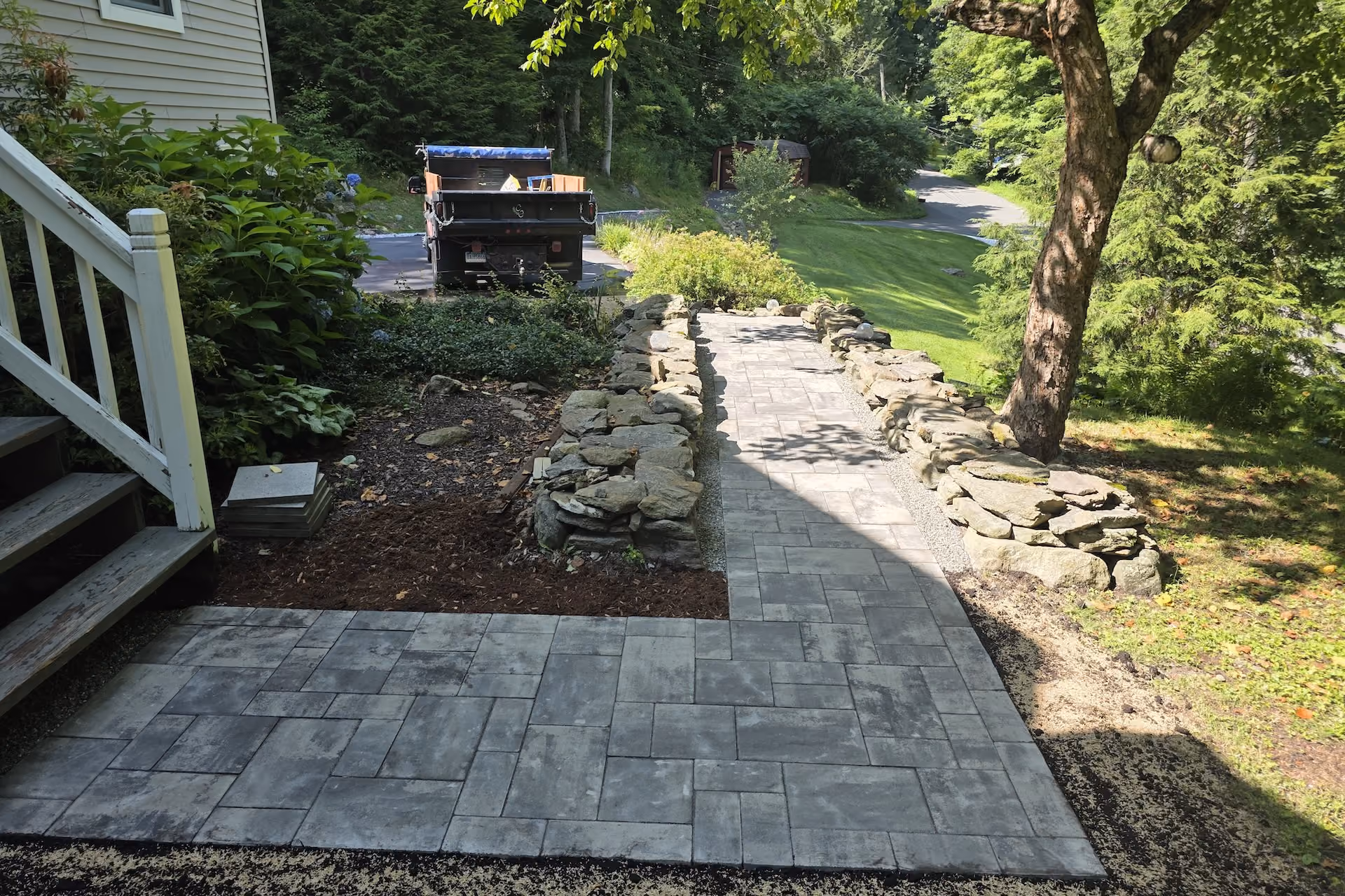 Professional hardscaping services by Classic Outdoors in Connecticut, featuring custom patios, walkways, and retaining walls.