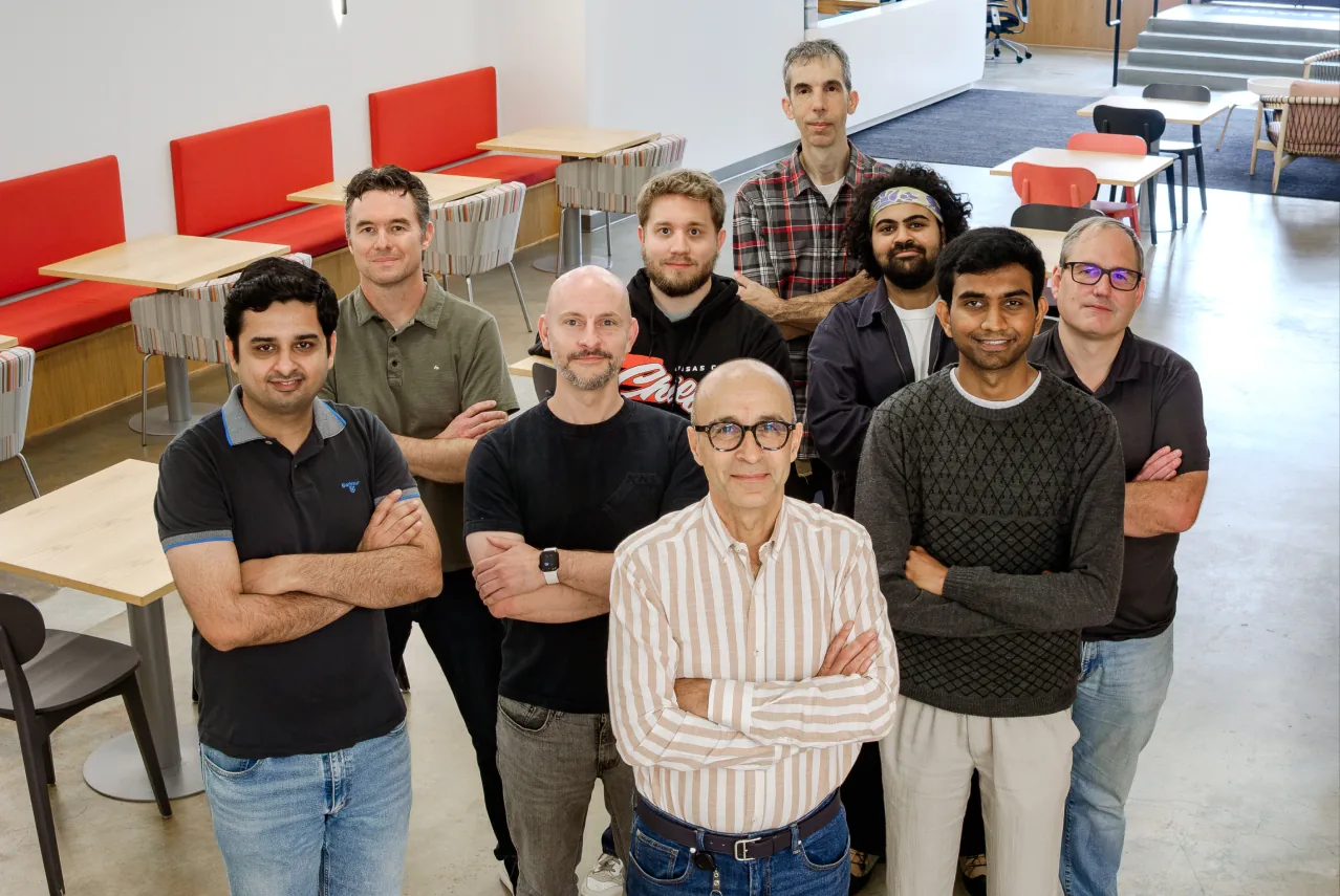 The Northstar team standing together in the office lounge