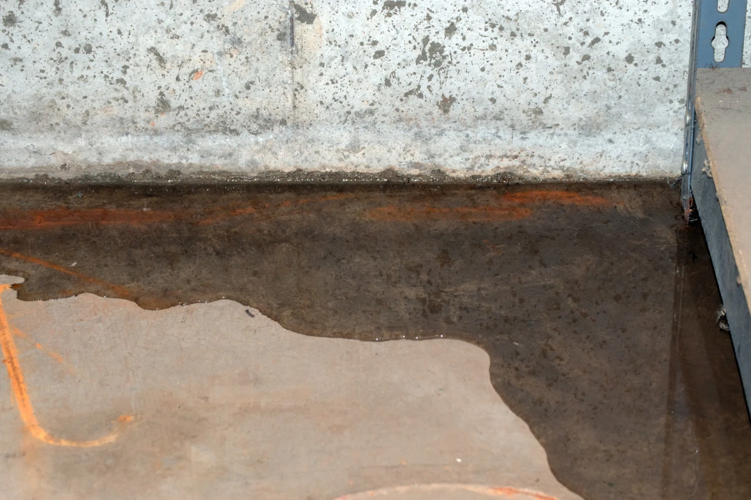 Water intrusion in a basement from improper grading.
