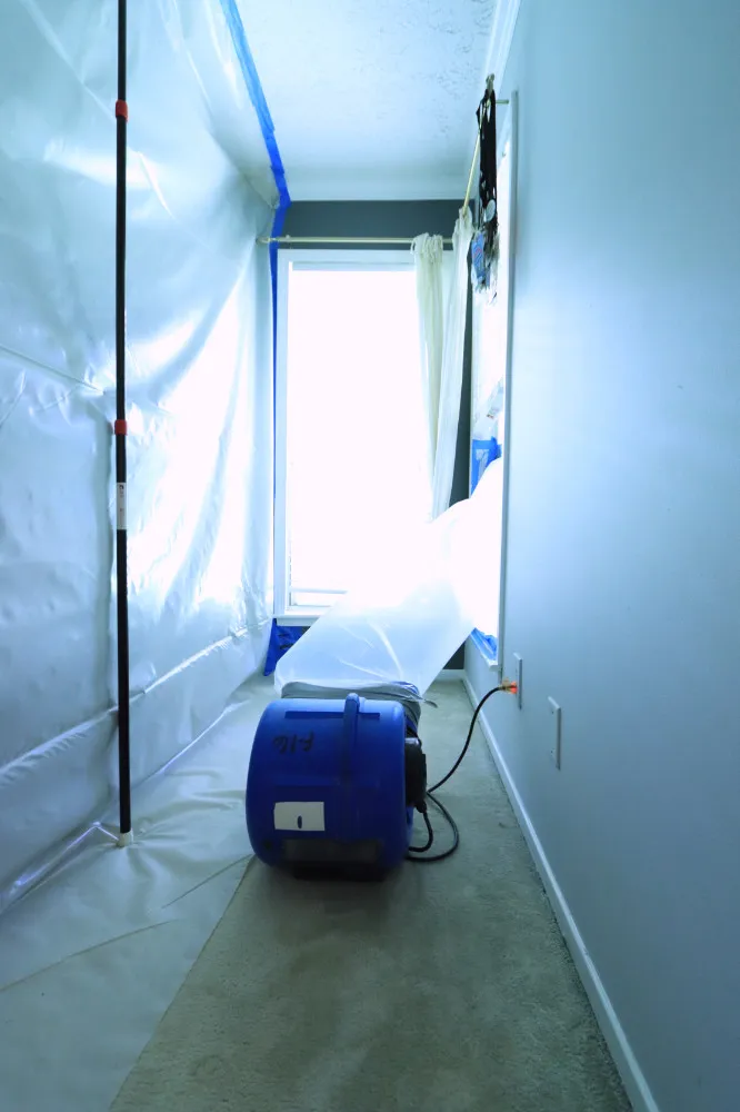 Containment barriers for mold remediation by Ensign Building Solutions