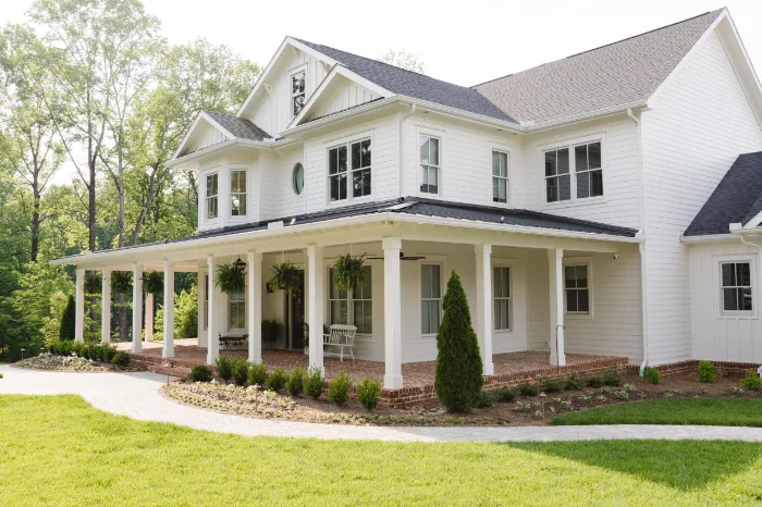 Custom Farmhouse on Lake by Goulding Custom Homes