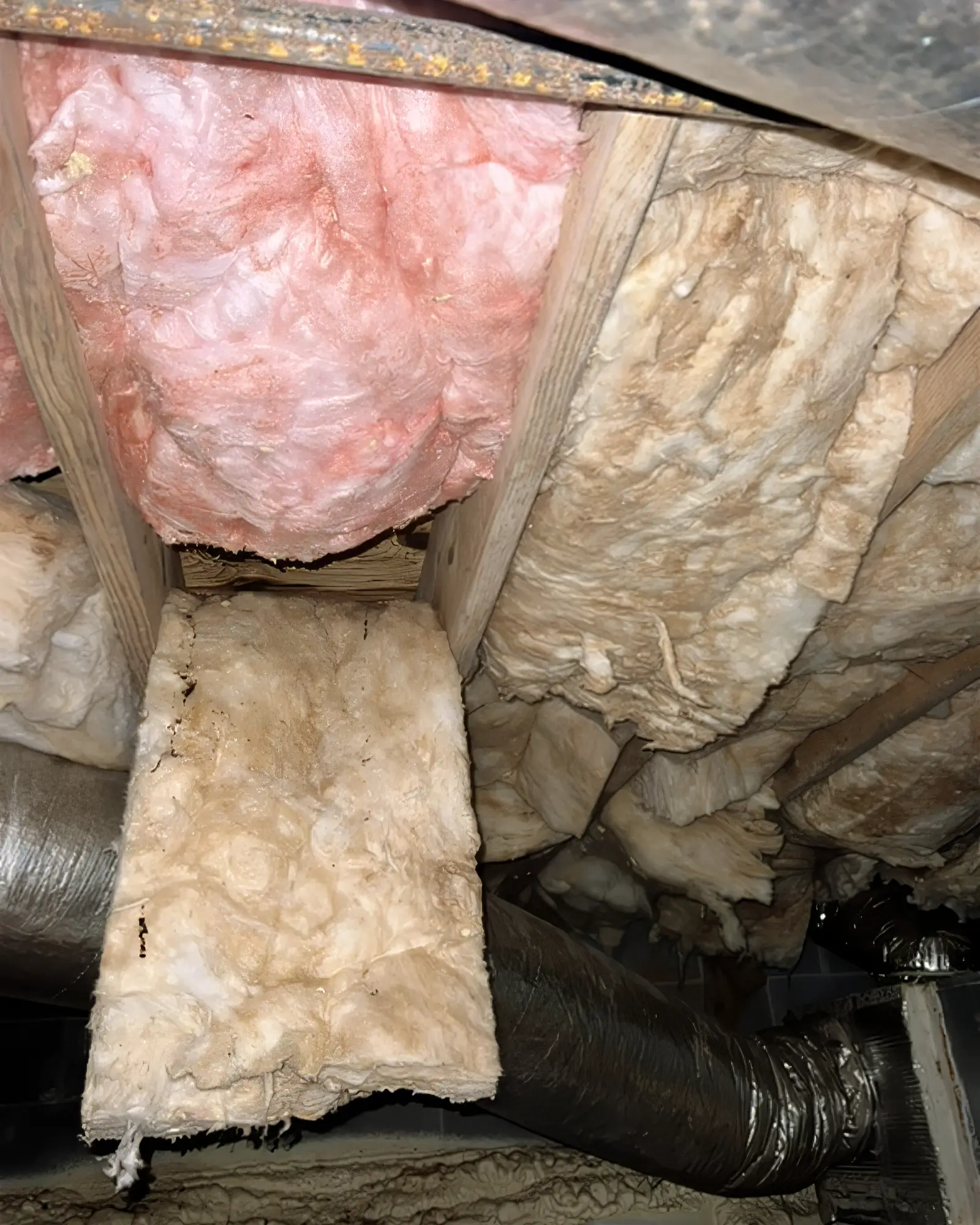 Insulation in the crawl space falling due to being saturated with moisture
