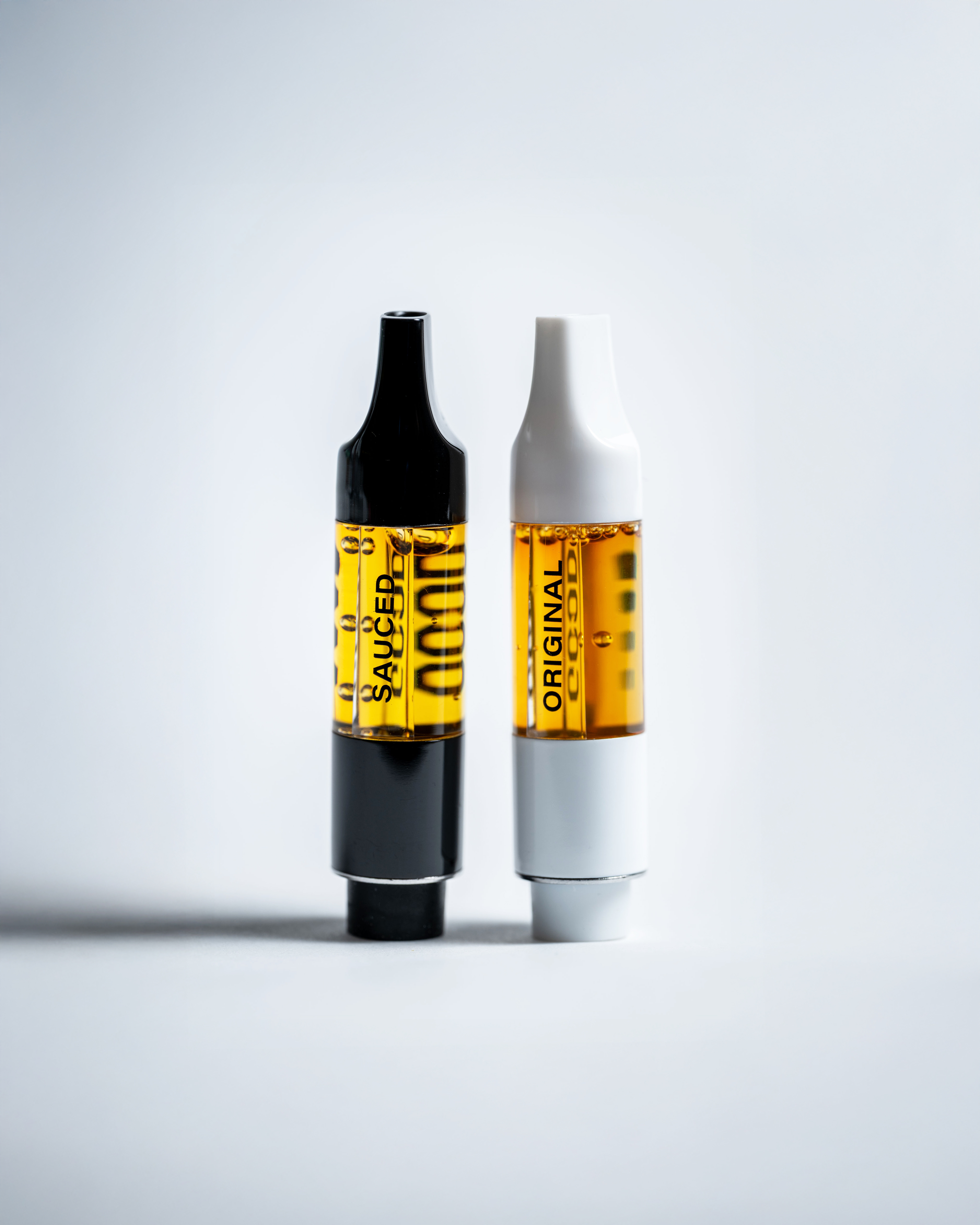 GOOD Sauced and Original vape cartridges side by side