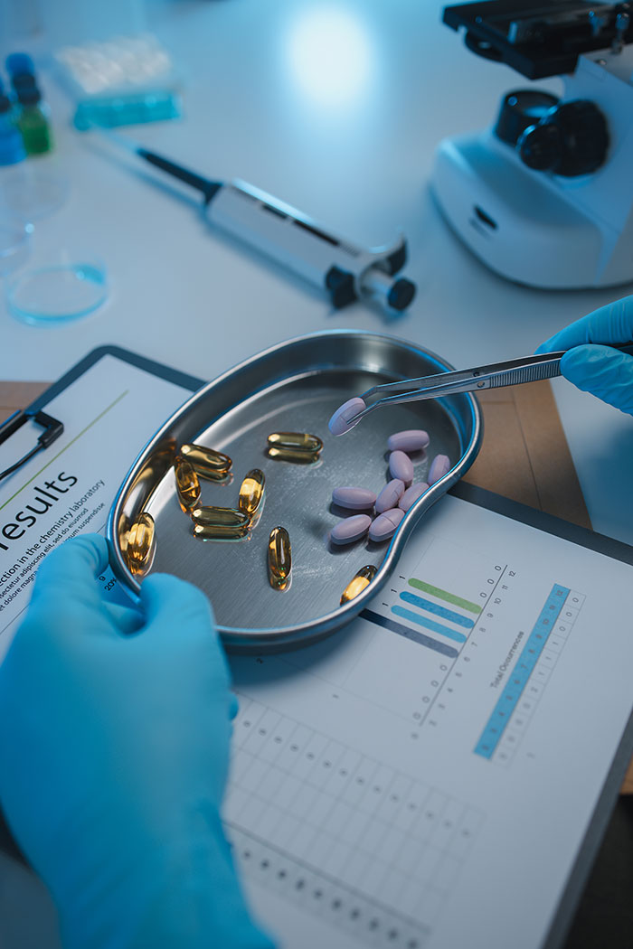 A scientist testing various supplements