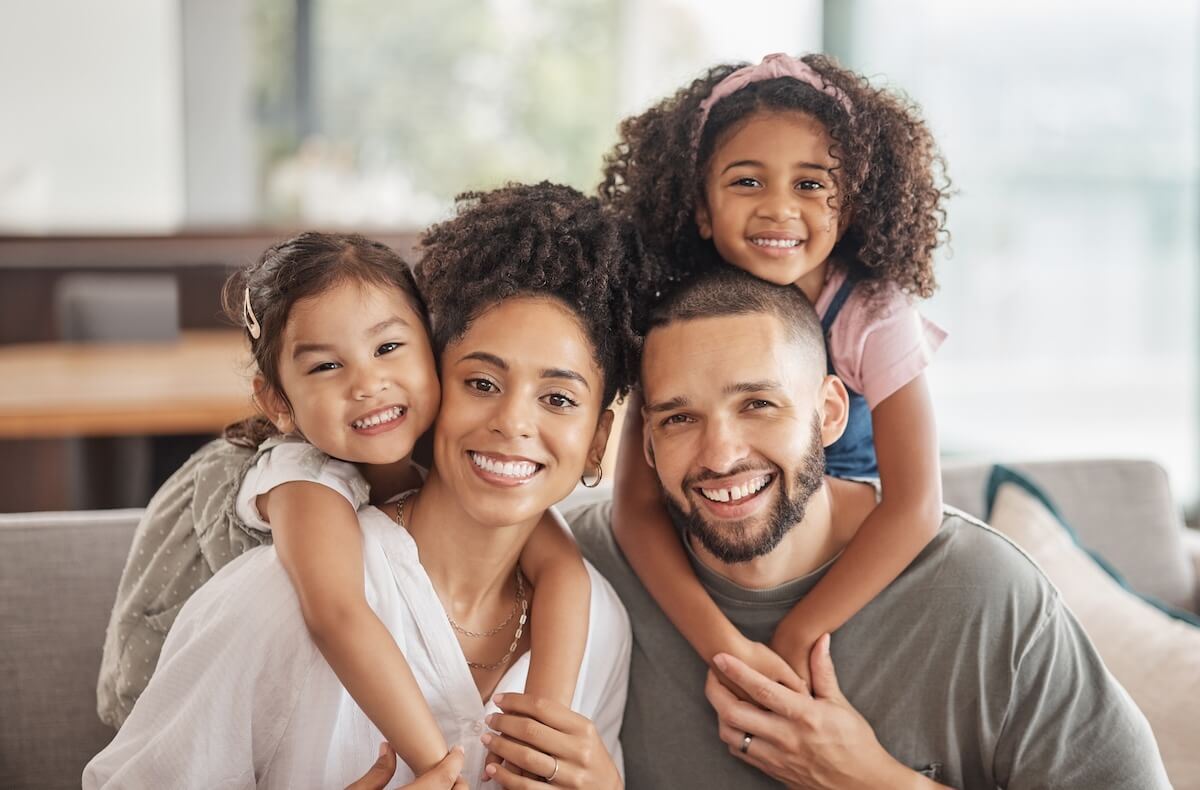 What tests are done to check for cancer: family smiling at the camera