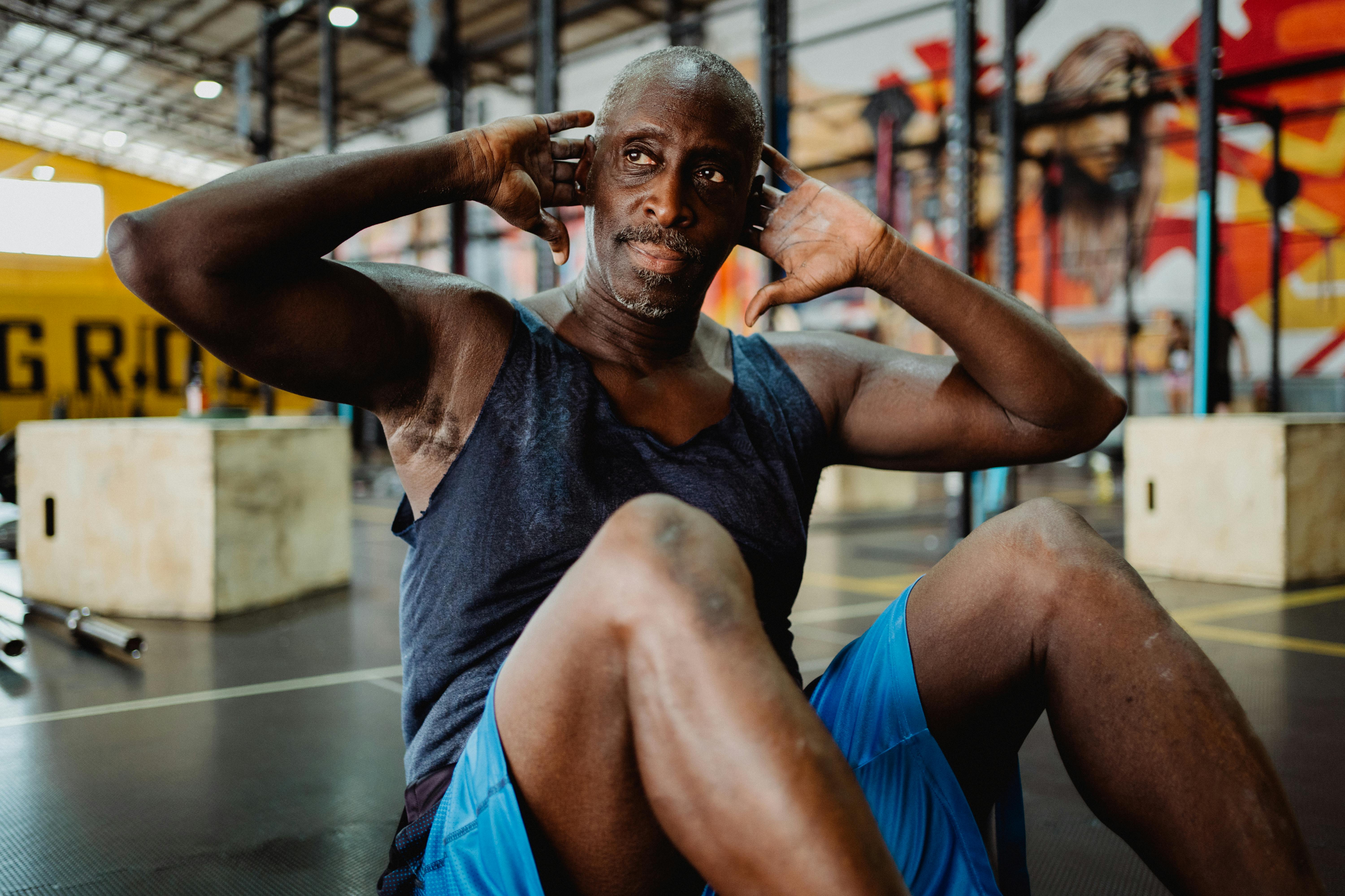 Older gentleman working out to promote a healthy body and mind
