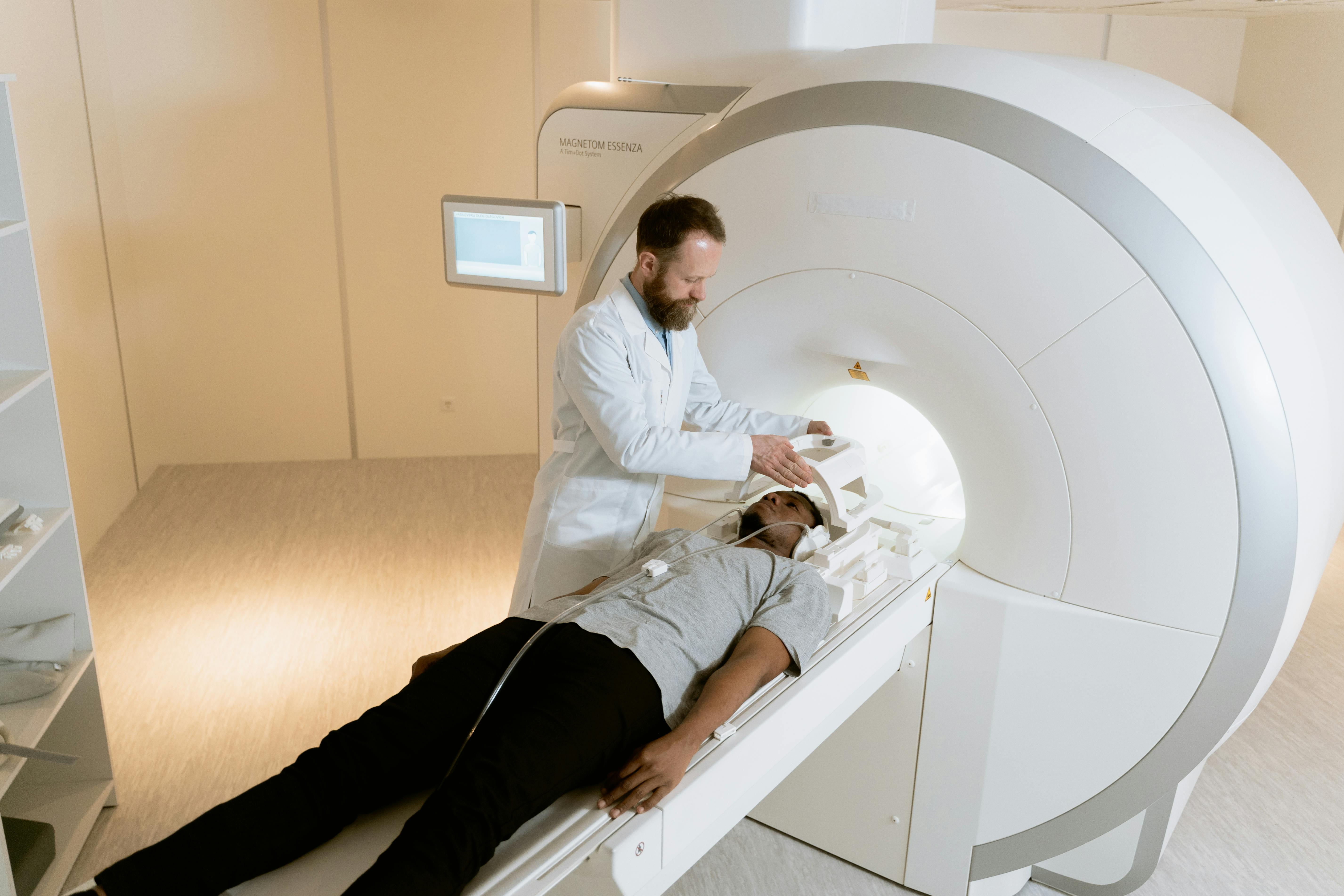 Photo Of A Doctor Examining Patient