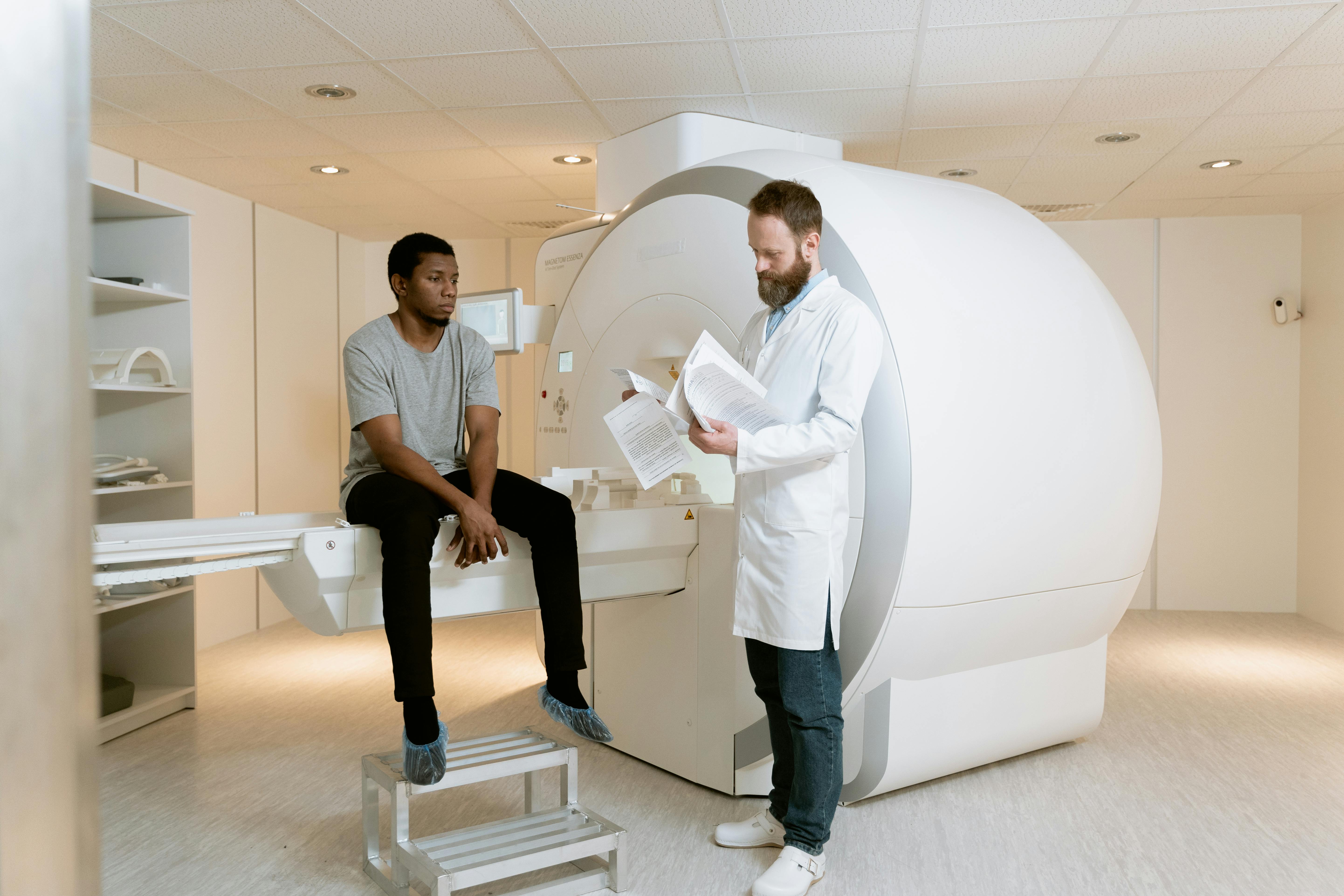 Man receiving information before having an MRI.