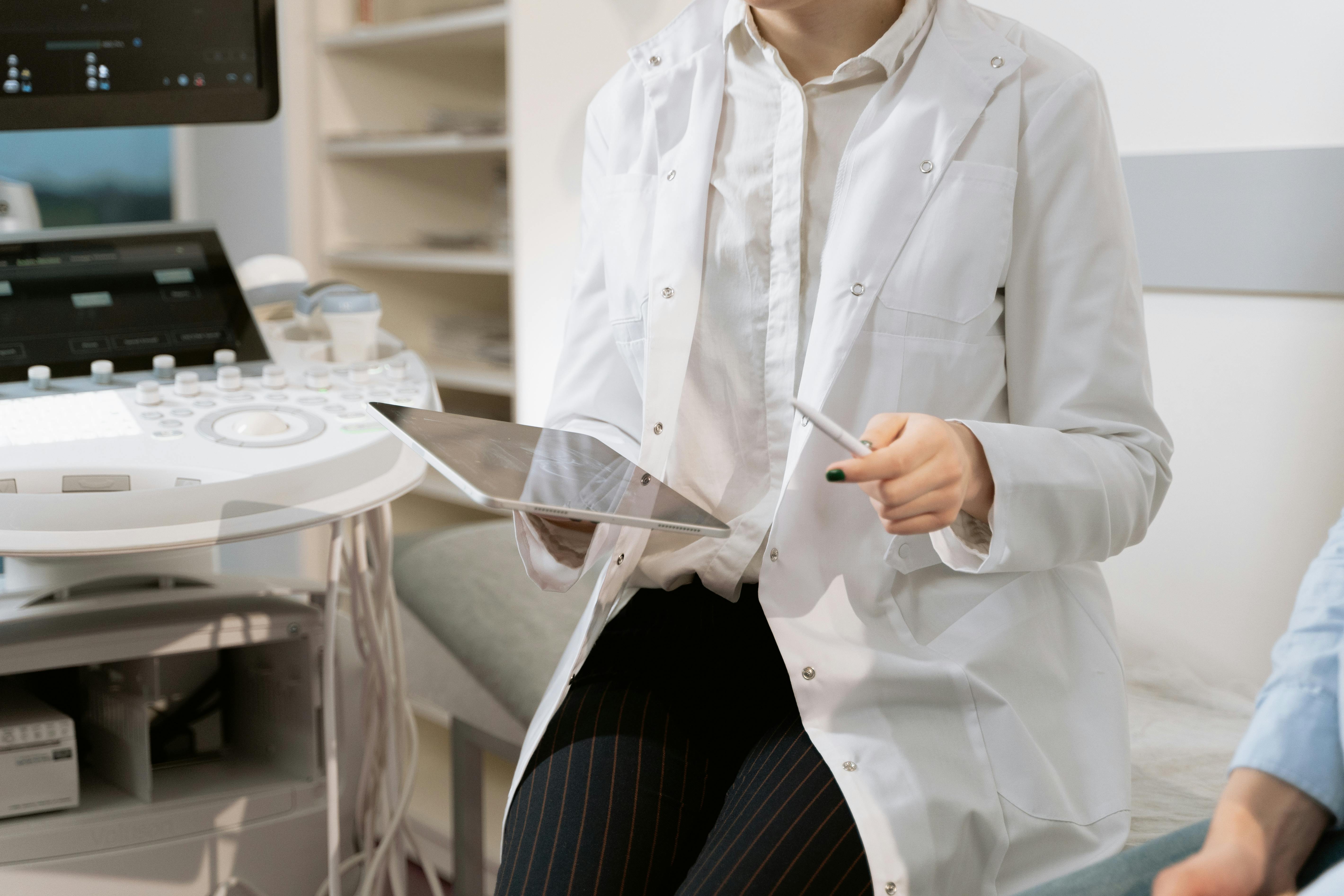 Medical practitioner looking at results.