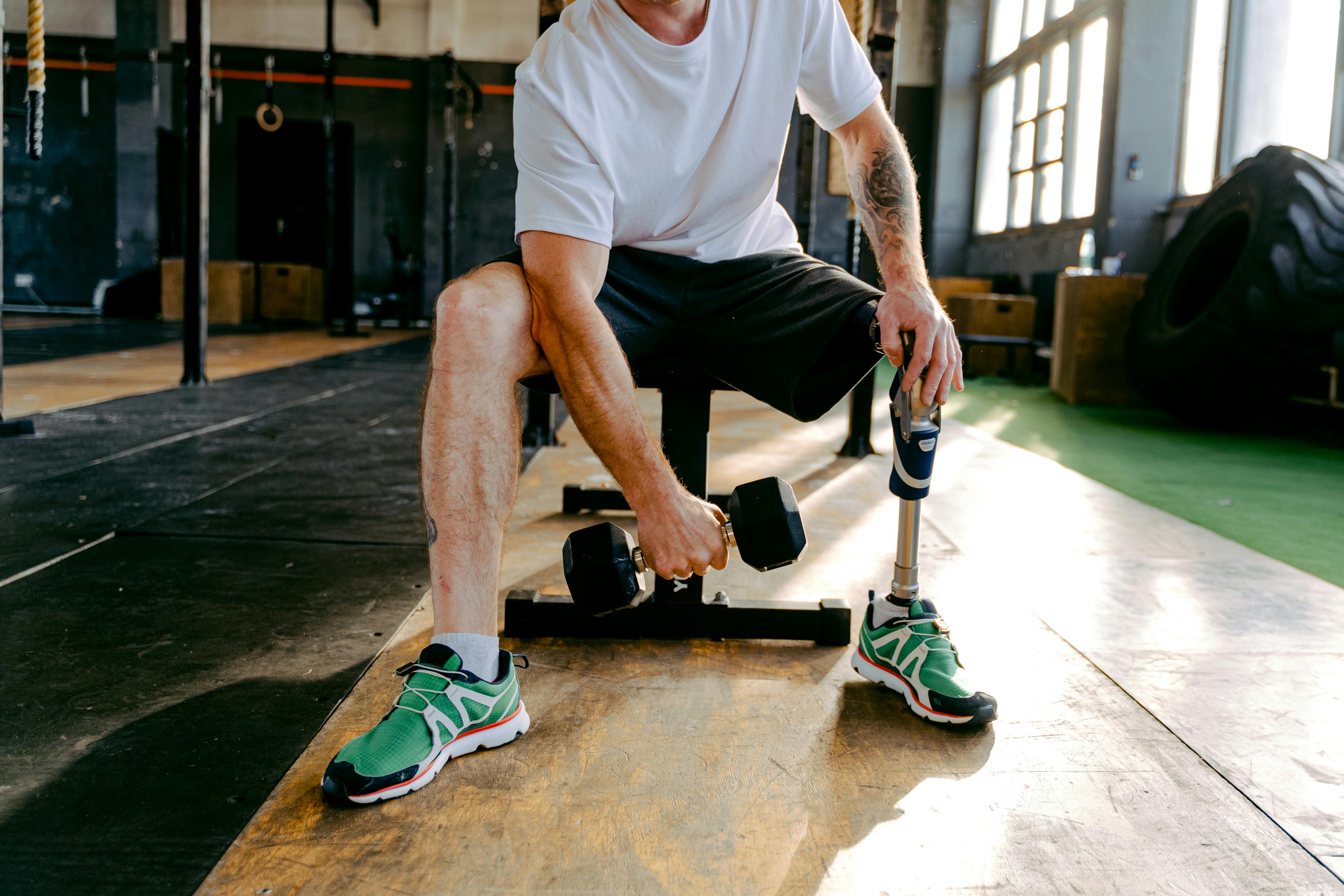A Man Working Out at the Gym