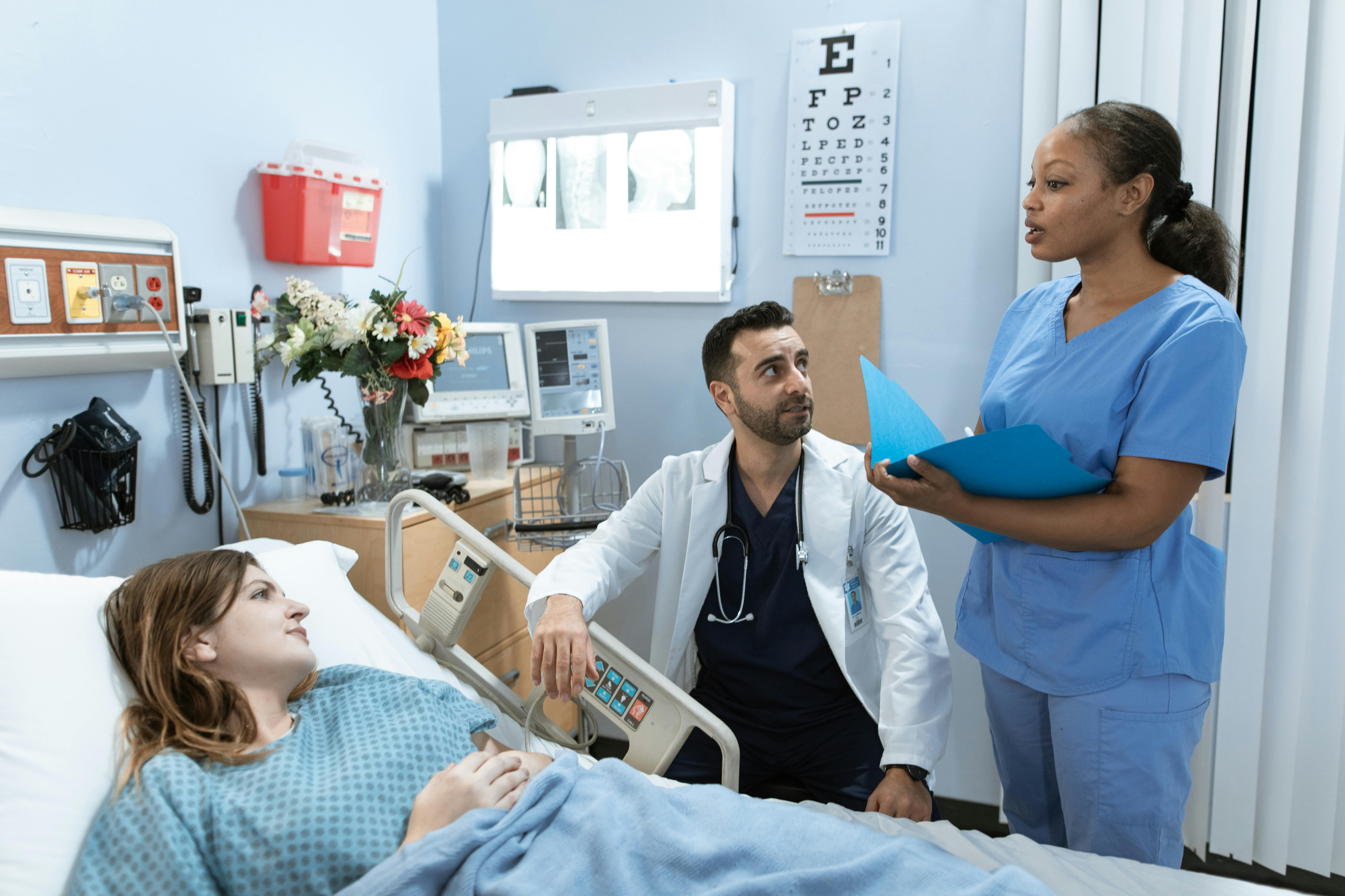A person wearing a hospital gown.