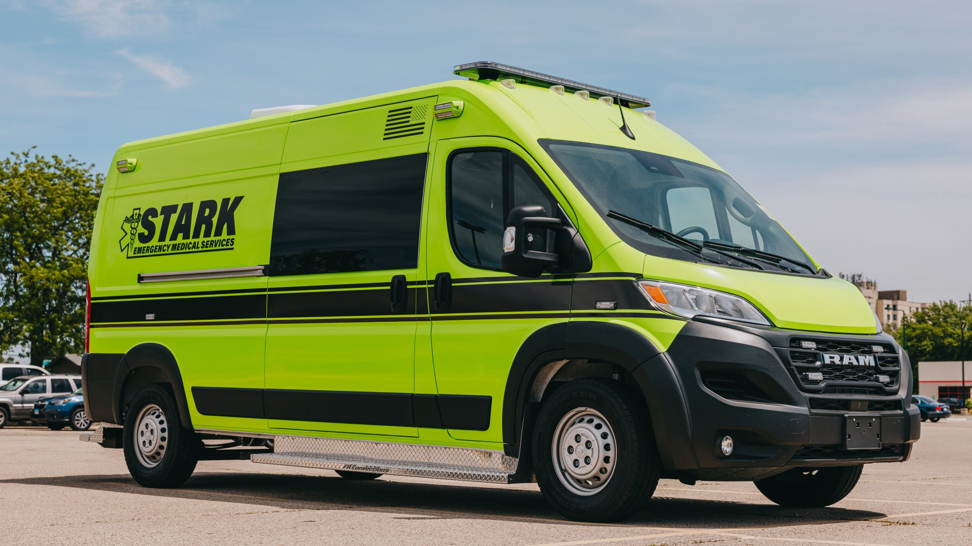 Stark County Ambulance transit-style ambulance parked outside a station