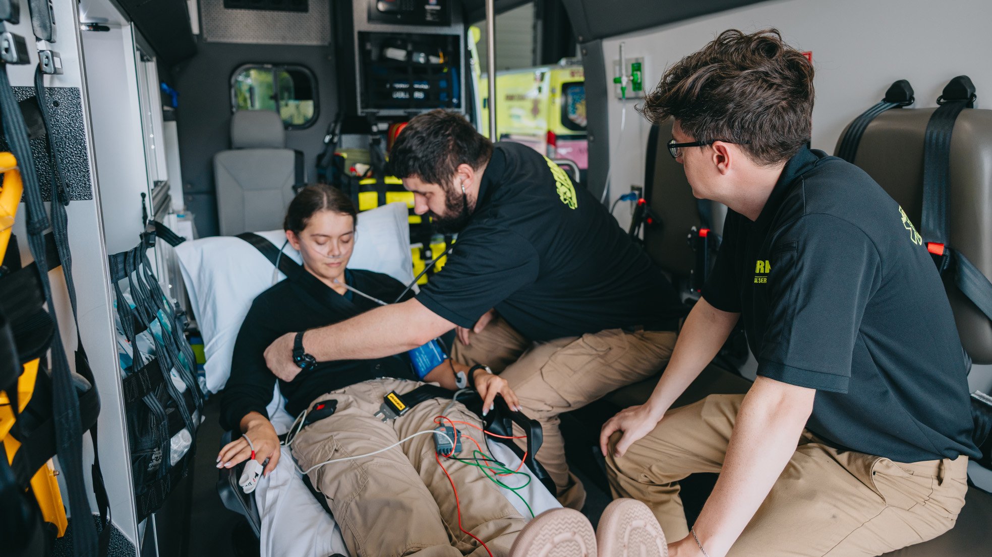 Stark County paramedics treating a patient inside an ambulance