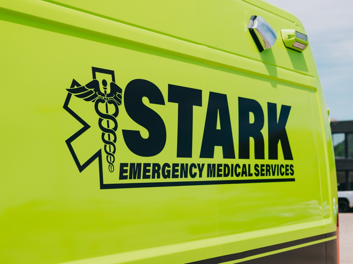 Close-up of the Stark County Emergency Medical Services logo on an ambulance