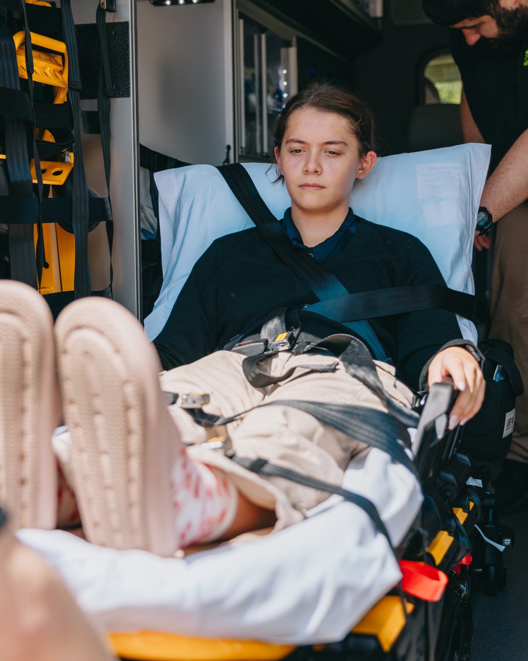 Patient secured on a stretcher inside a Stark County ambulance