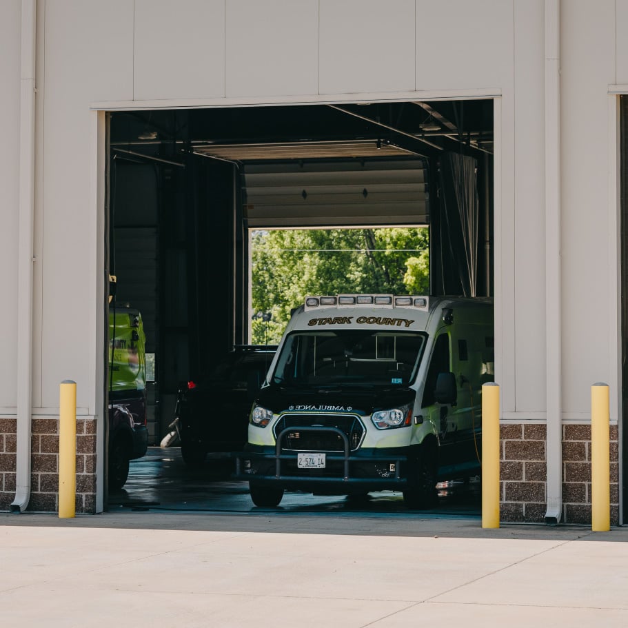 Stark County Ambulance unit parked in an open apparatus bay
