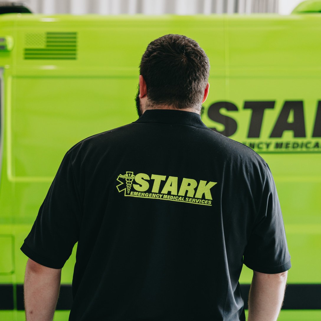 Stark County paramedic at an ambulance outside a hospital