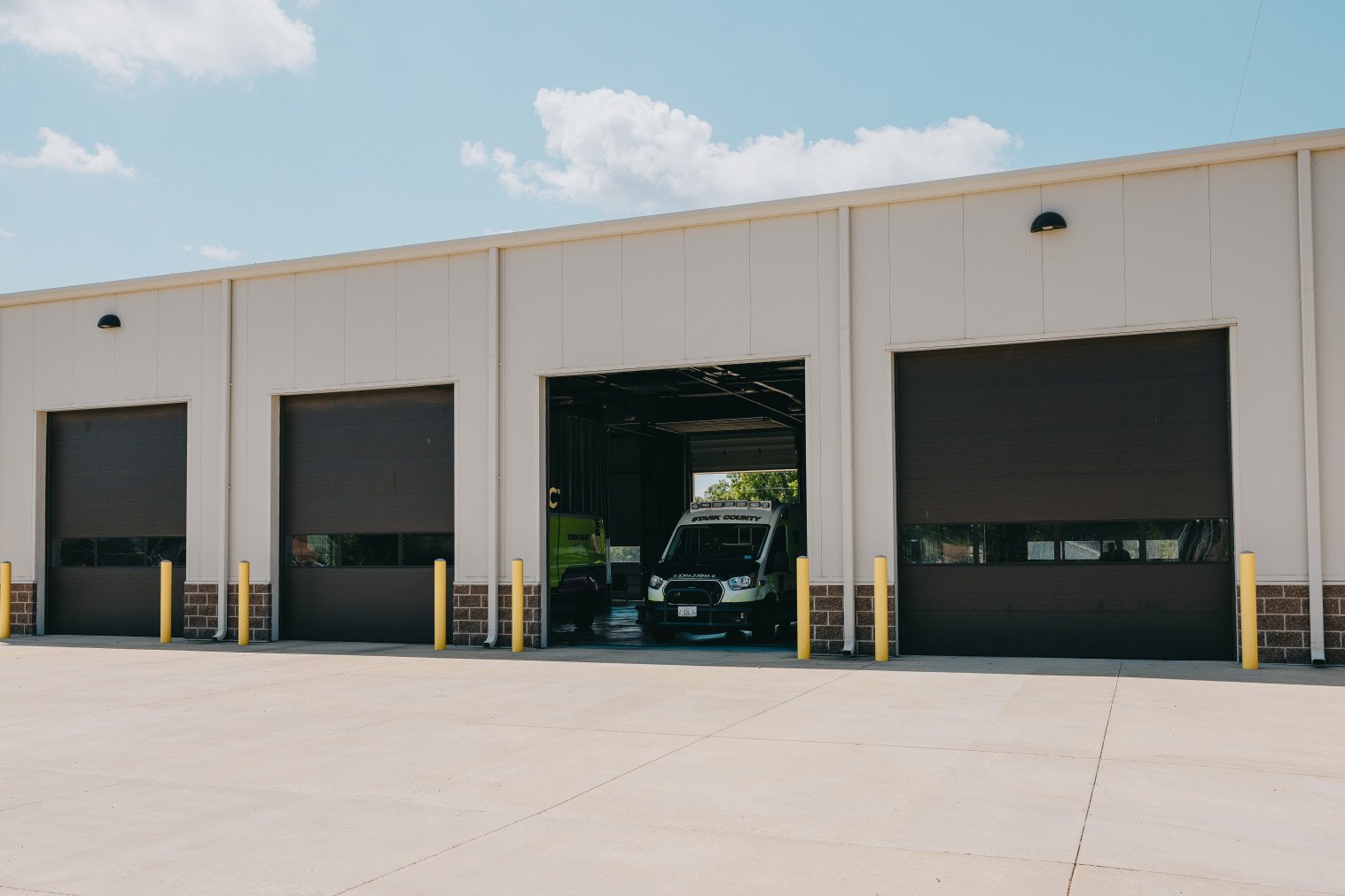 Exterior apparatus bays at a Stark County Ambulance station