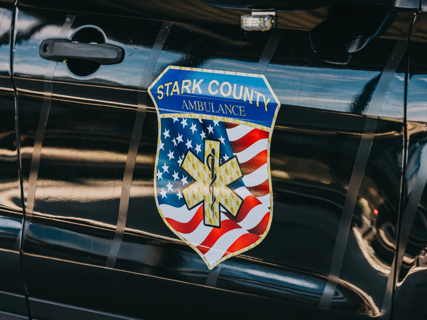 Stark County Ambulance shield emblem on a response SUV