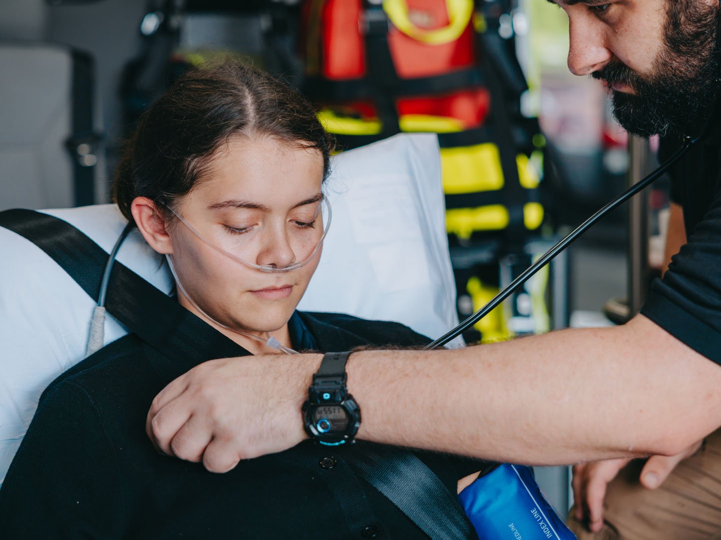Patient seated in the back of a Stark County ambulance