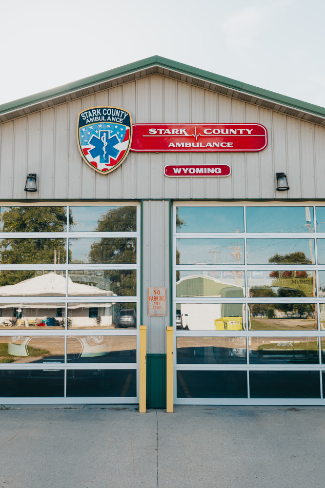 Stark County Ambulance shield and Wyoming signage above the bays at the Wyoming station