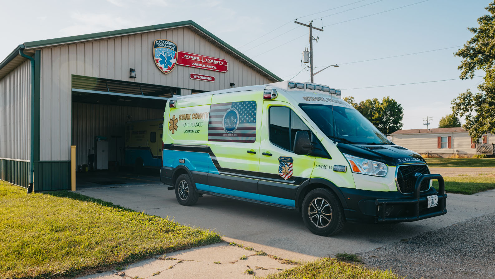 Stark County Ambulance unit parked outside the open bay at the Wyoming station in Wyoming, Illinois