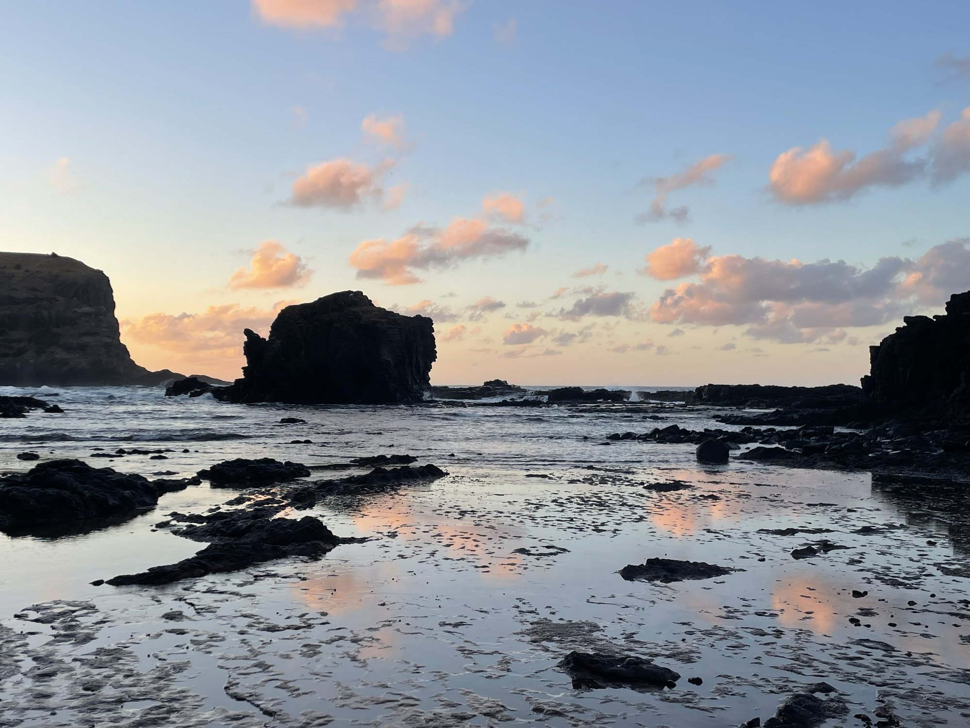 Tidal rock pools at Bushrangers Bay under a pink dawn sky