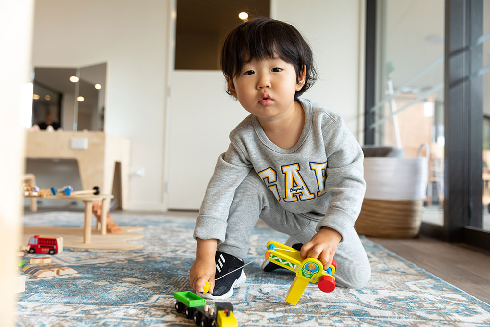 TV kid playing with toys