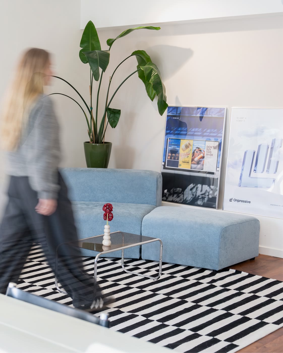 The Onpressive studio lounge with framed campaign posters