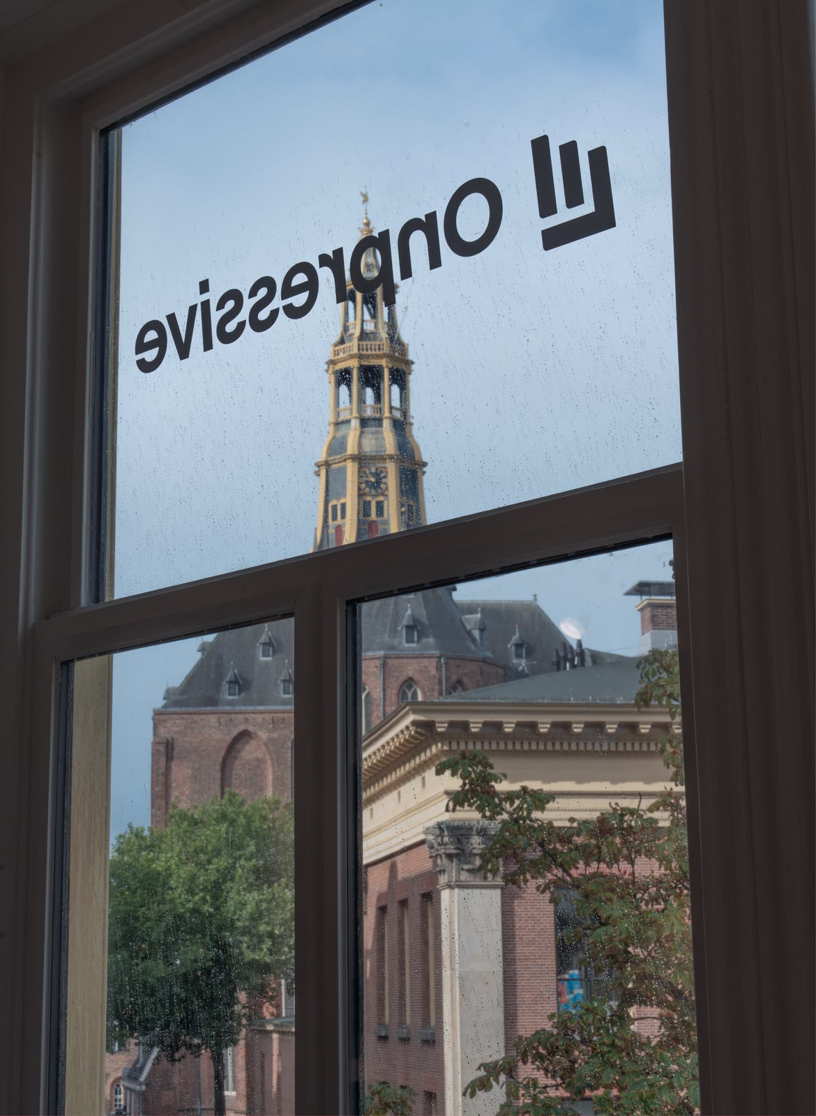 The view from inside the Onpressive studio through the lettered window
