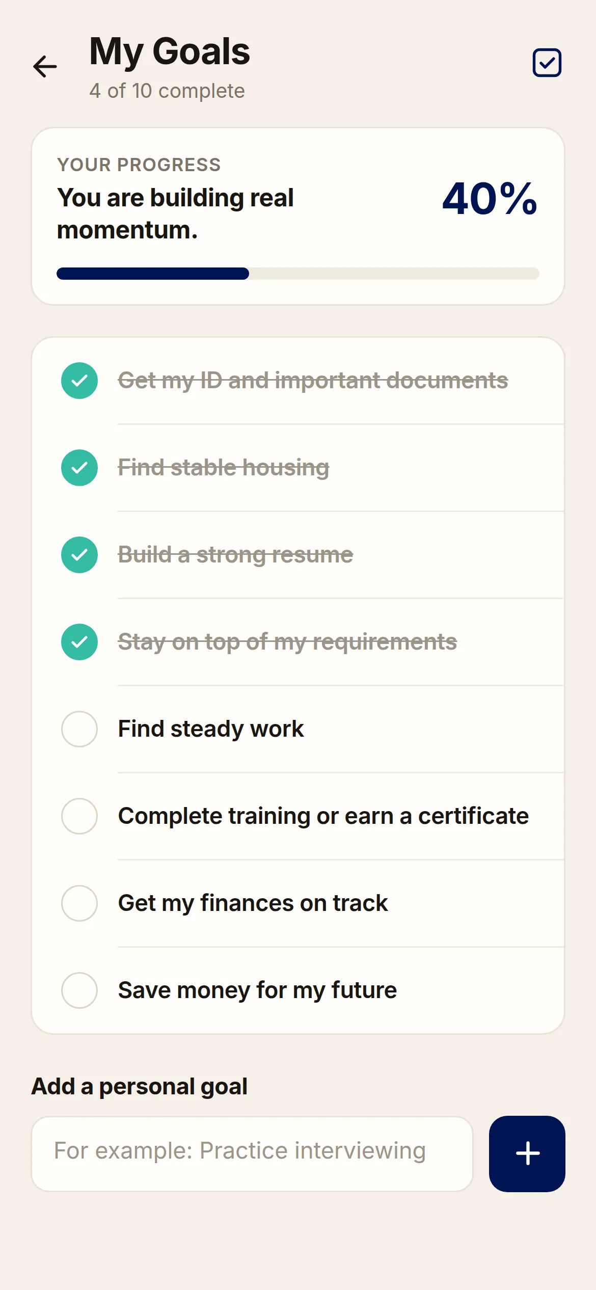 Free and Forward app goal tracker showing four of ten goals complete and a progress bar at 40 percent