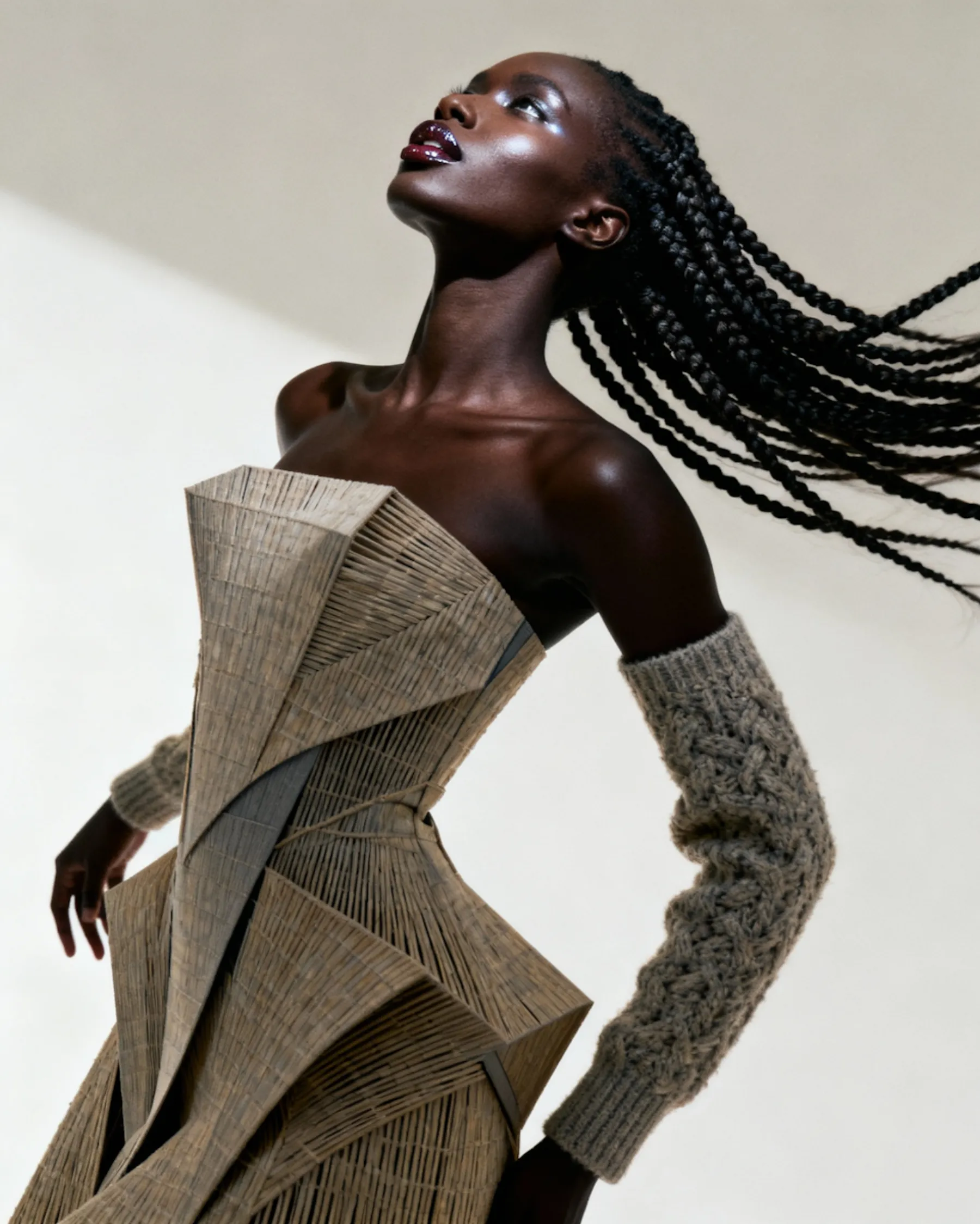 Dynamic fashion portrait with expressive movement and contemporary styling.