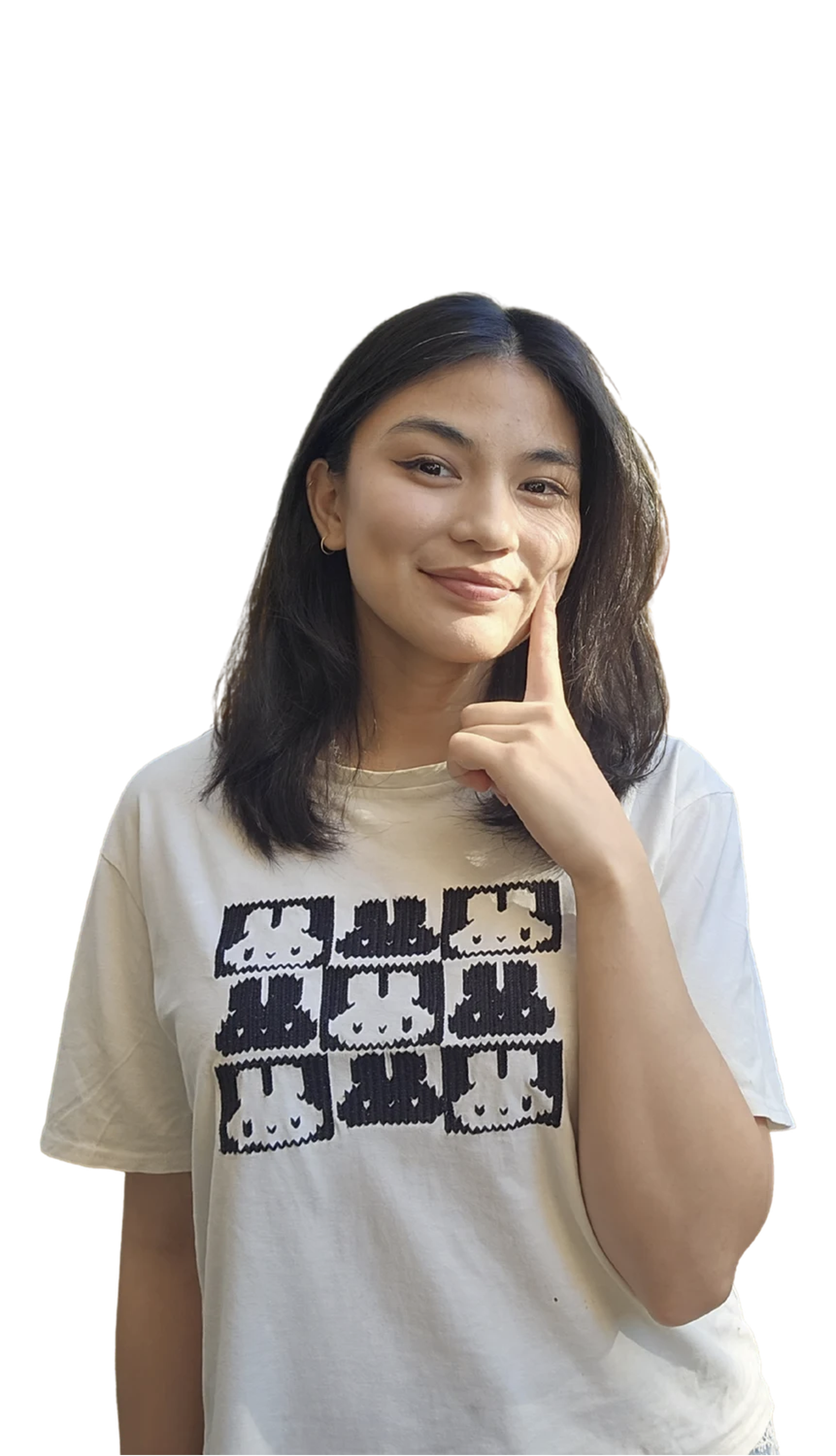 Chance smiling with a finger on her cheek