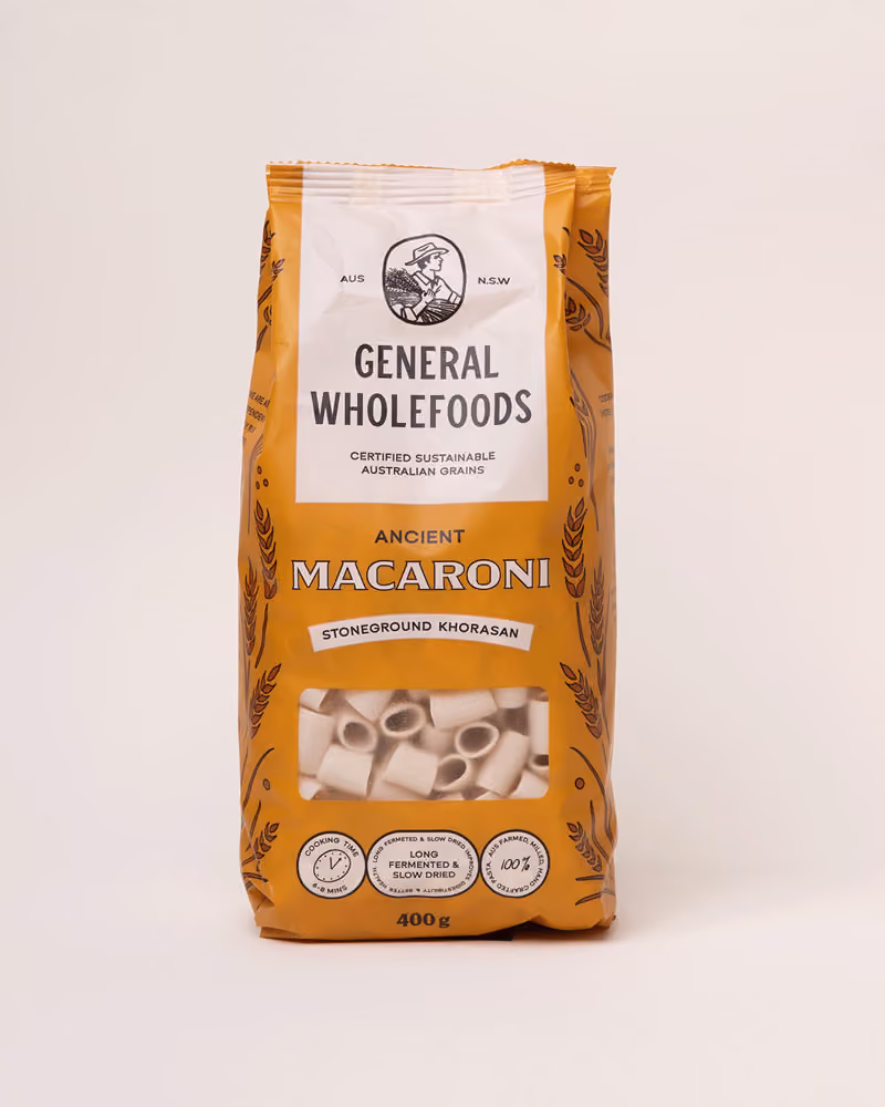 Package of General Wholefoods Ancient Shells stoneground spelt pasta with a window showing shell-shaped pasta inside.