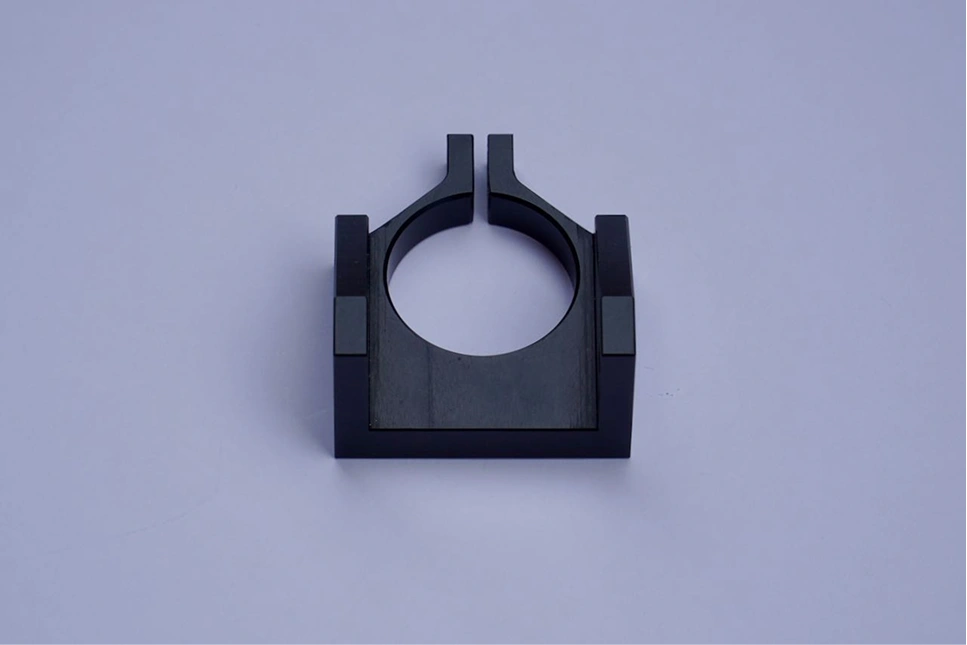 Black-finished CNC-milled clamping collar with circular opening