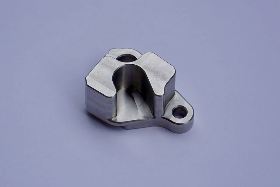 CNC-milled metal bracket with contoured cavity