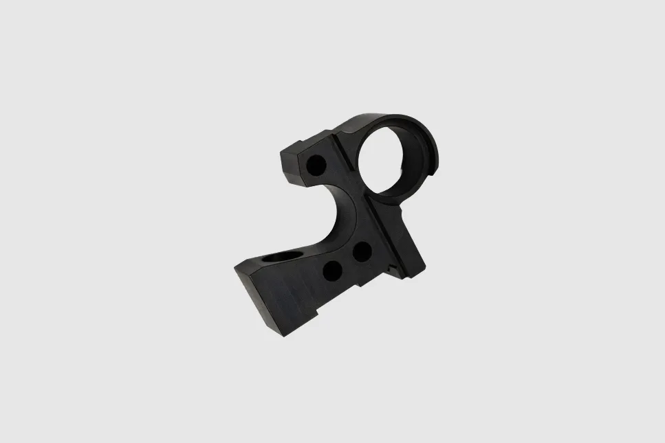 Black-finished contoured bracket with circular opening