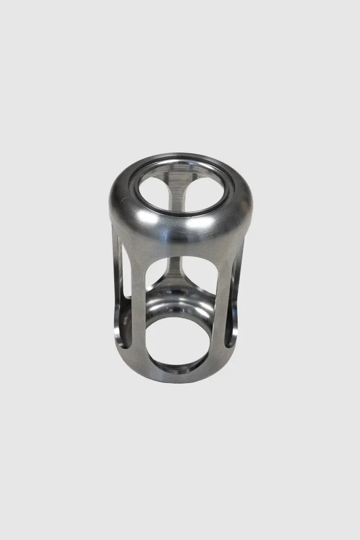 CNC-machined cylindrical part with lightening holes