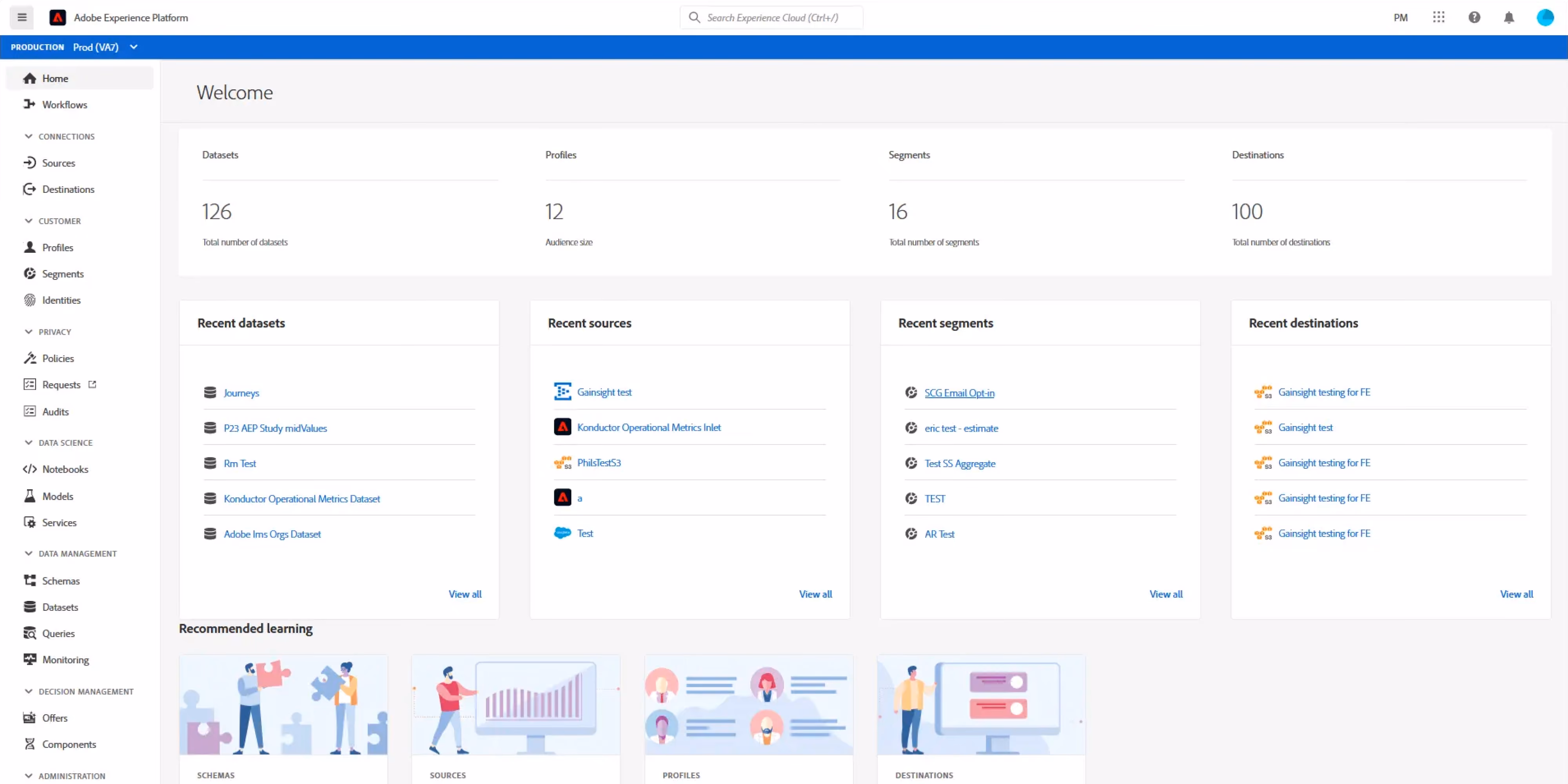 Adobe Experience Platform dashboard showing overview metrics including 126 datasets, 12 profiles, 16 segments, and 100 destinations. The screen is divided into sections for recent datasets, sources, segments, and destinations, each listing recent entries with icons and links. A left sidebar menu categorizes navigation options such as Connections, Customer, Privacy, Data Science, Data Management, Decision Management, and Administration. The top bar includes a search box, user initials, and notification icons. The bottom section shows recommended learning modules with illustrations for Schemas, Sources, Profiles, and Destinations.