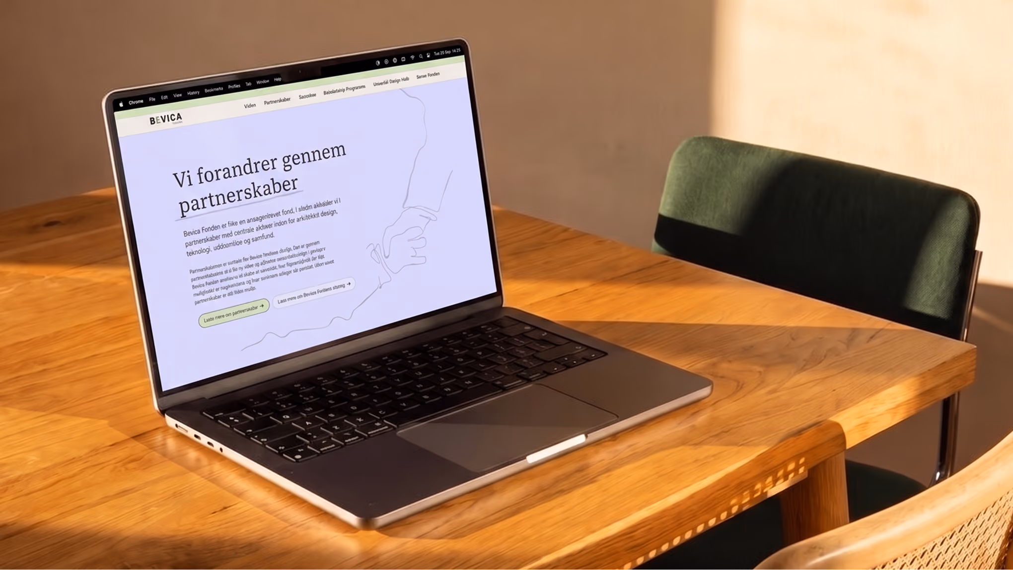 Bevica Fonden homepage on a laptop, with a lavender background, partnership headline and continuous-line drawing of joined hands.