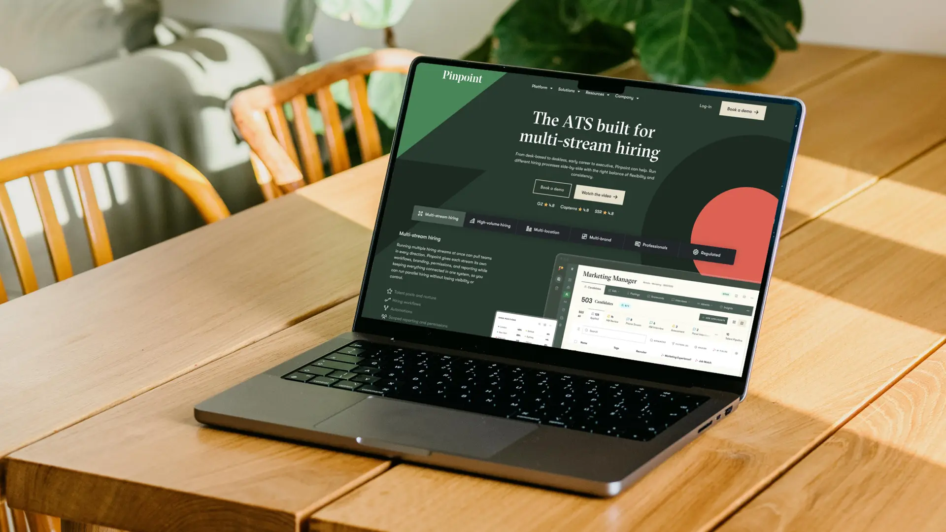 Pinpoint homepage on a laptop, presenting its applicant tracking system for multi-stream hiring.
