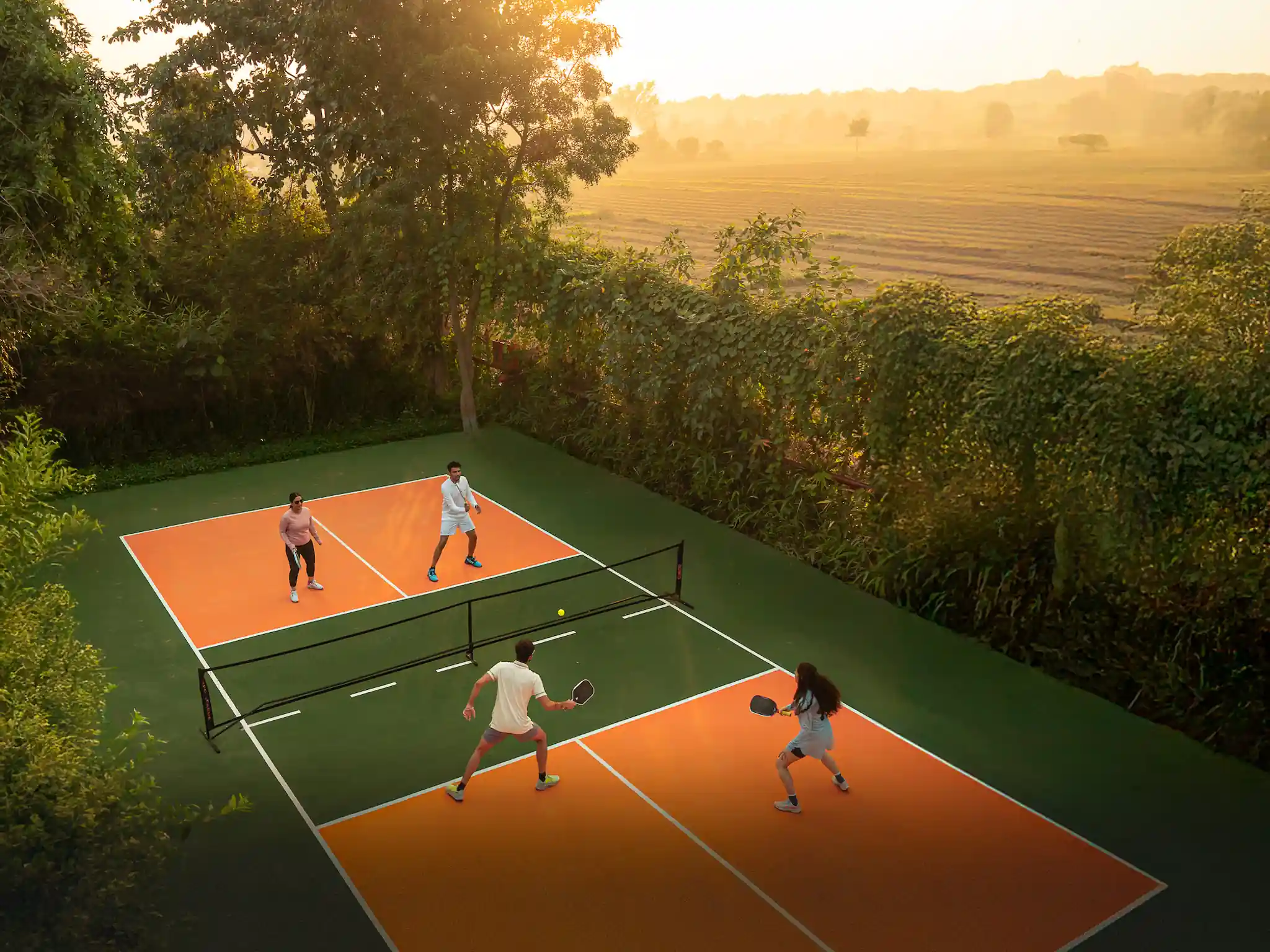 Pickleball court in the forest at Aahana