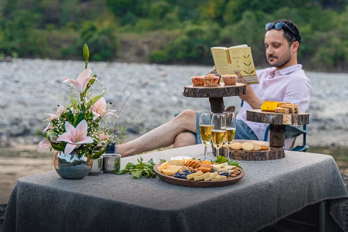 Riverside picnic setup by the Ramganga river